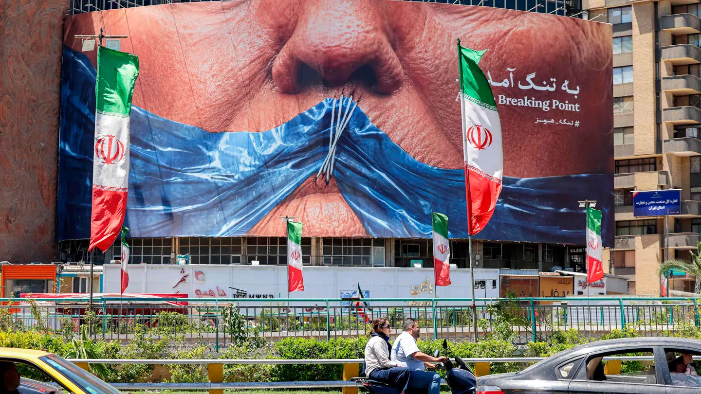Anti-Trump-plakat i Teheran. USA og Iran indgik en våbenhvile i april.