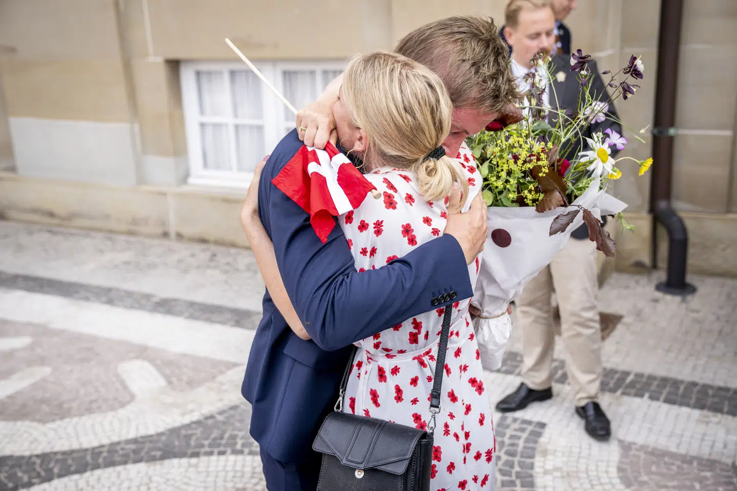 Børne-, ældre-, og boligminister Jacob Mark (SF) med sin hustru og borgmester i Holbæk, Christina Krzyrosiak Hansen, da den nye regering blev præsenteret på Amalienborg Slot i København. (Arkivfoto).