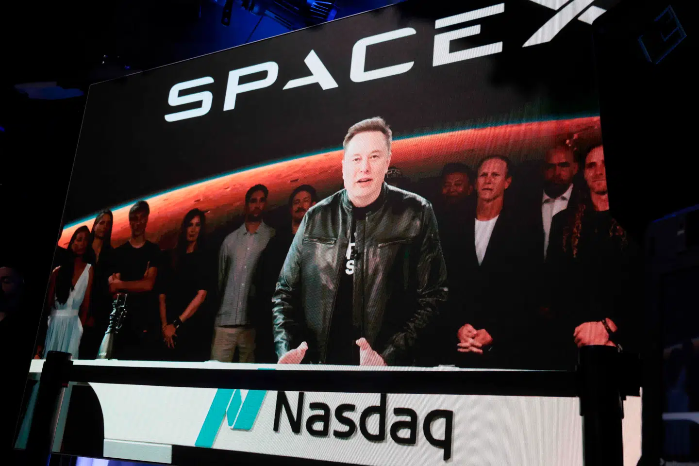 NEW YORK, NEW YORK - JUNE 12: Elon Musk, founder and CEO of SpaceX, speaks via video before the ringing of opening bell at the Nasdaq Marketsite at the launch of the company's initial public offering (IPO) on June 12, 2026 in New York City.