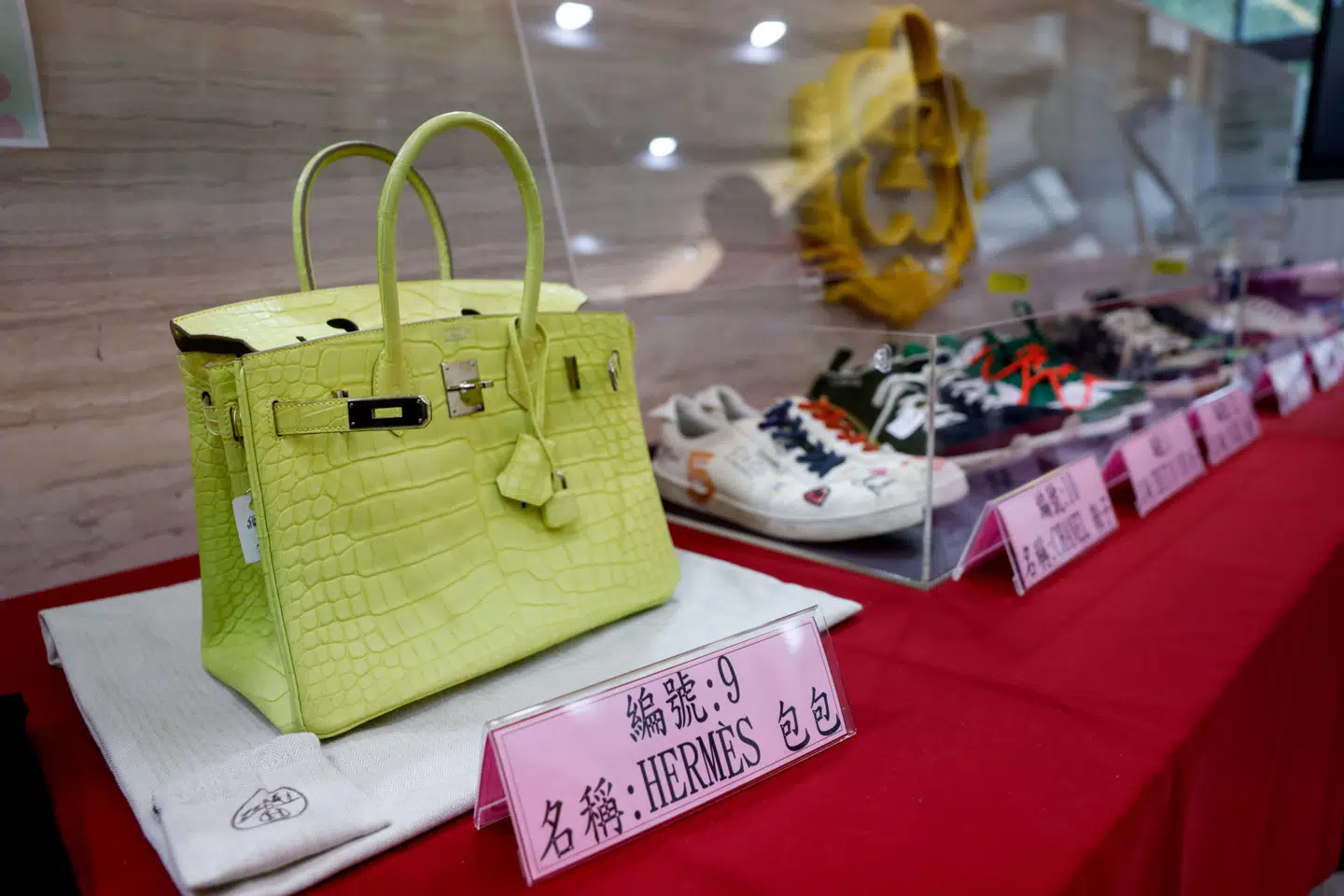 A Hermès Birkin bag is seen on display during an auction of luxury goods seized from people linked to Prince Group, a multinational network accused of running vast scam centre operations, in Taipei, Taiwan, February 3, 2026. REUTERS/Ann Wang
