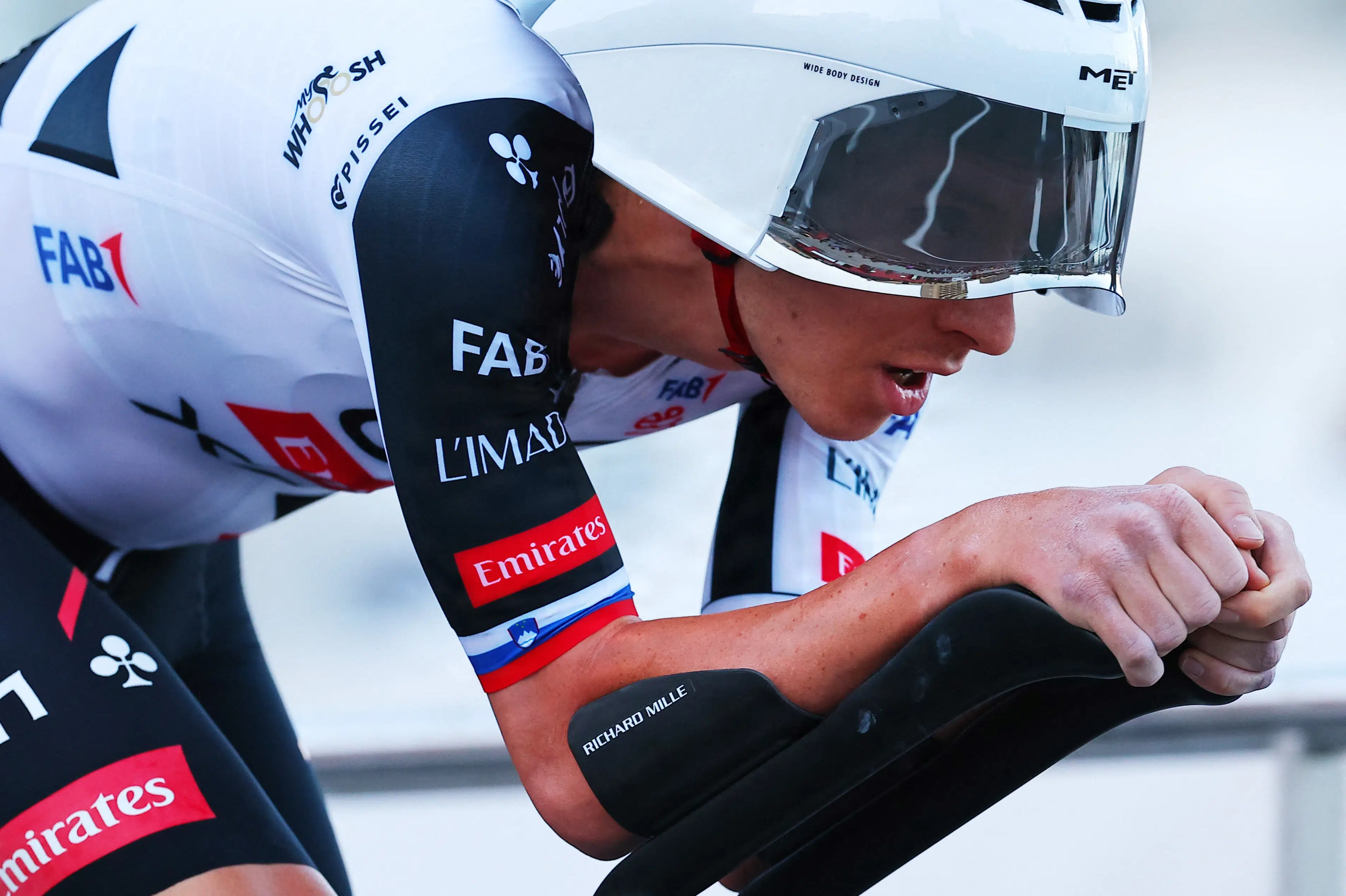 Pogacar wins Vuelta's opening stage by hair's breadth in Monaco