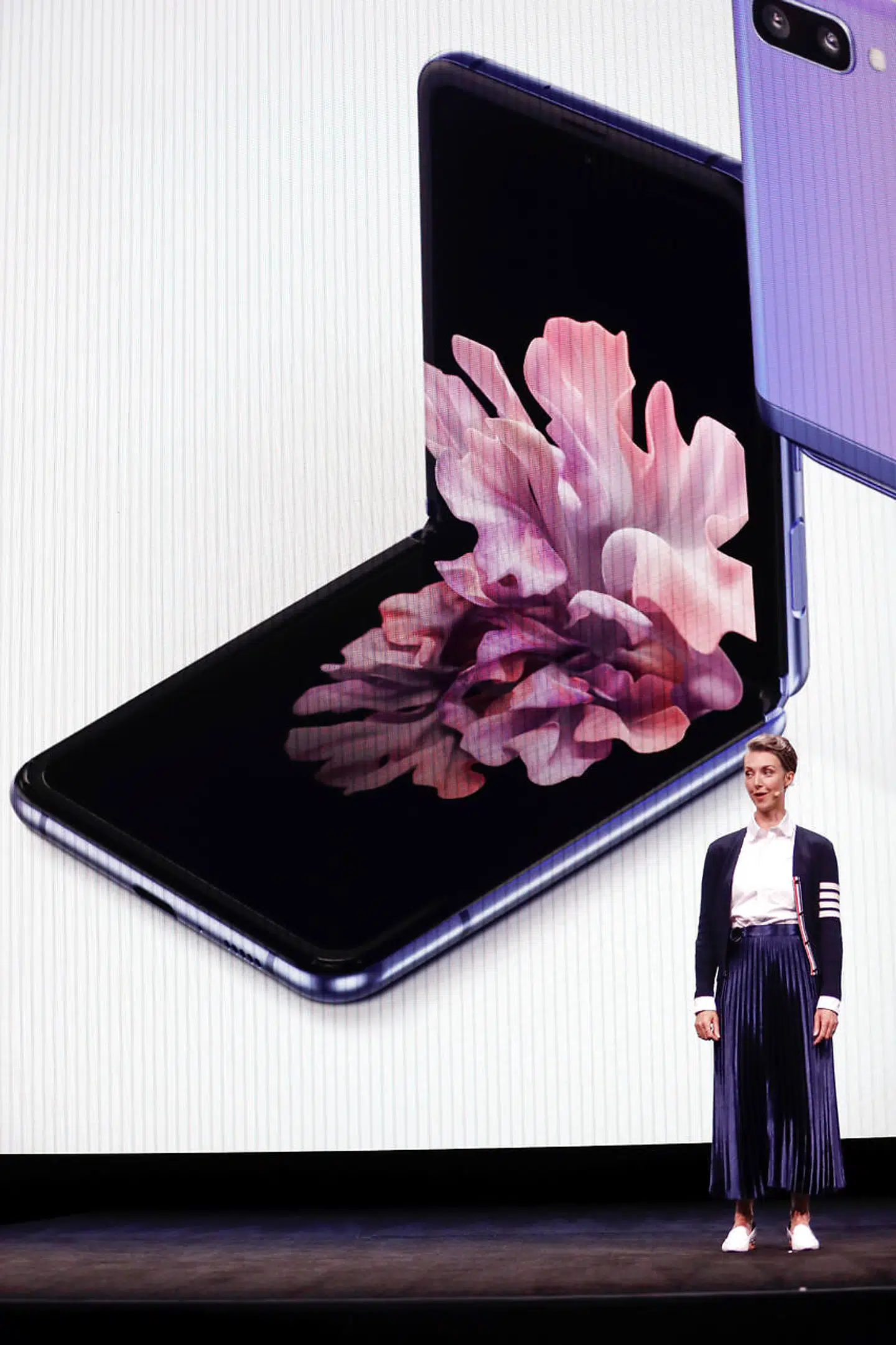 Rebecca Hirst, head of UK product marketing of Samsung Electronics, unveils the Z Flip foldable smartphone during Samsung Galaxy Unpacked 2020 in San Francisco, California, U.S. February 11, 2020. REUTERS/Stephen Lam
