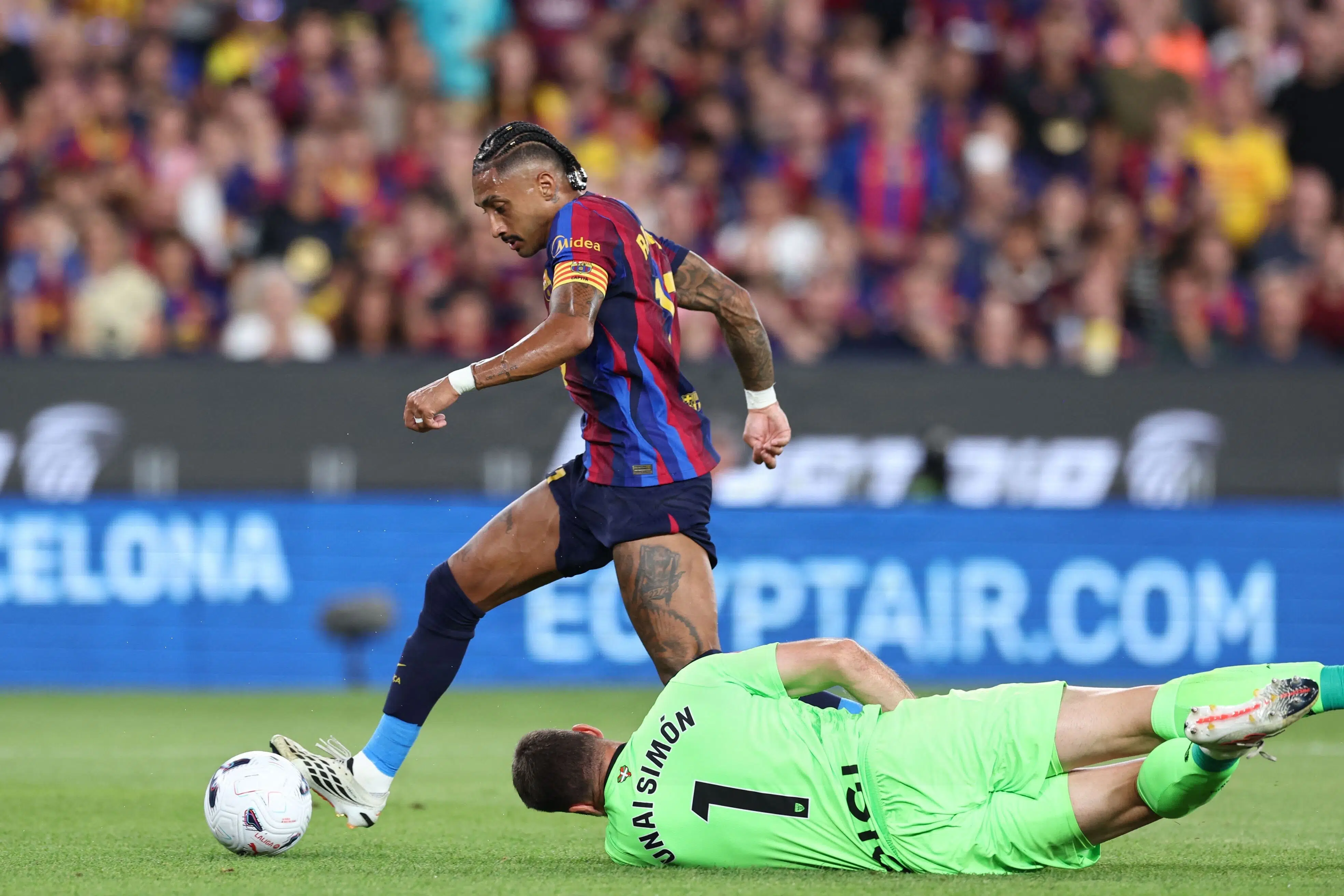 Barcelona tops La Liga with 2-0 win over Athletic Club