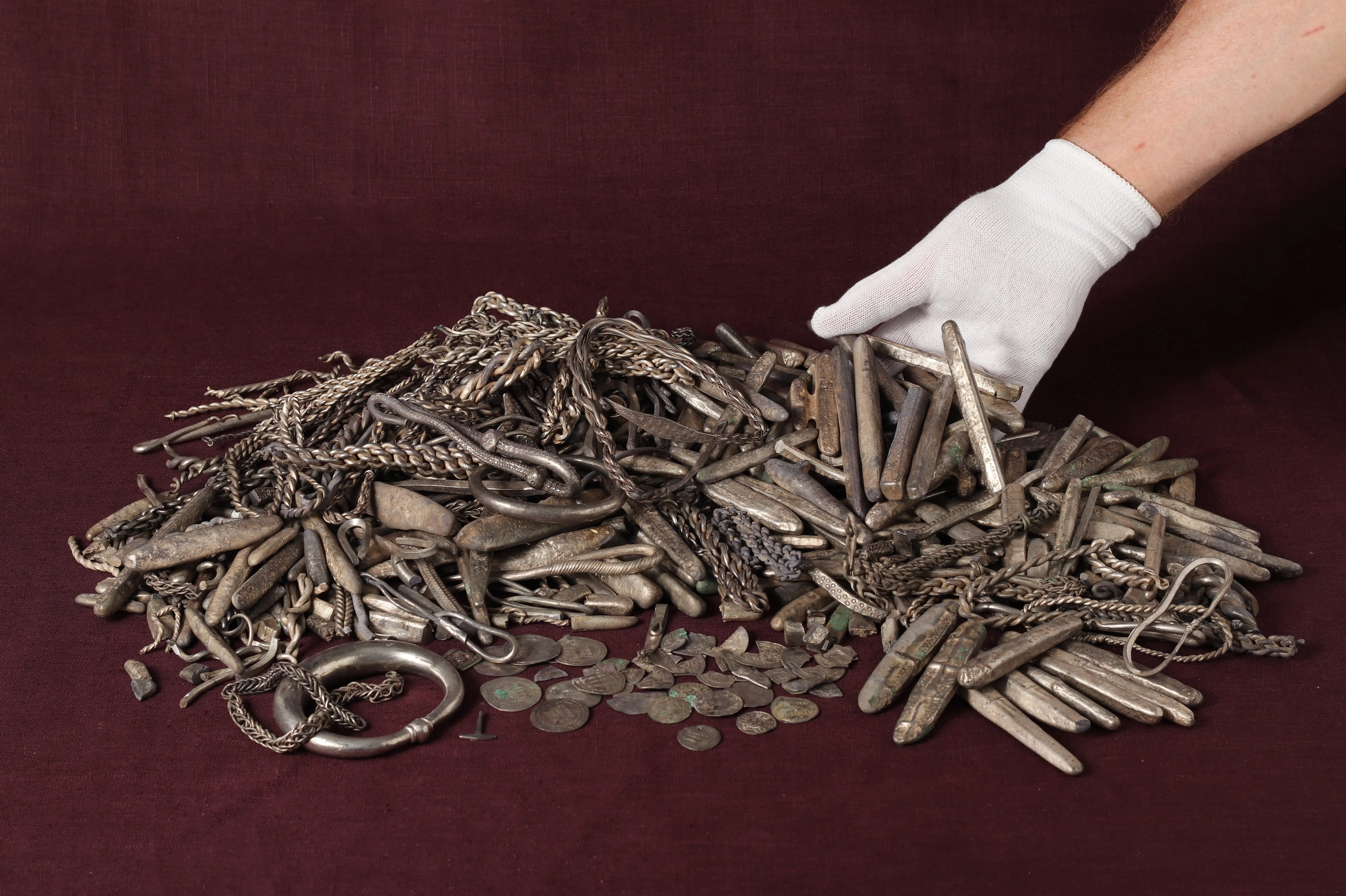 Terrace Dig Unearths Denmark’s Largest Viking-Age Silver Hoard