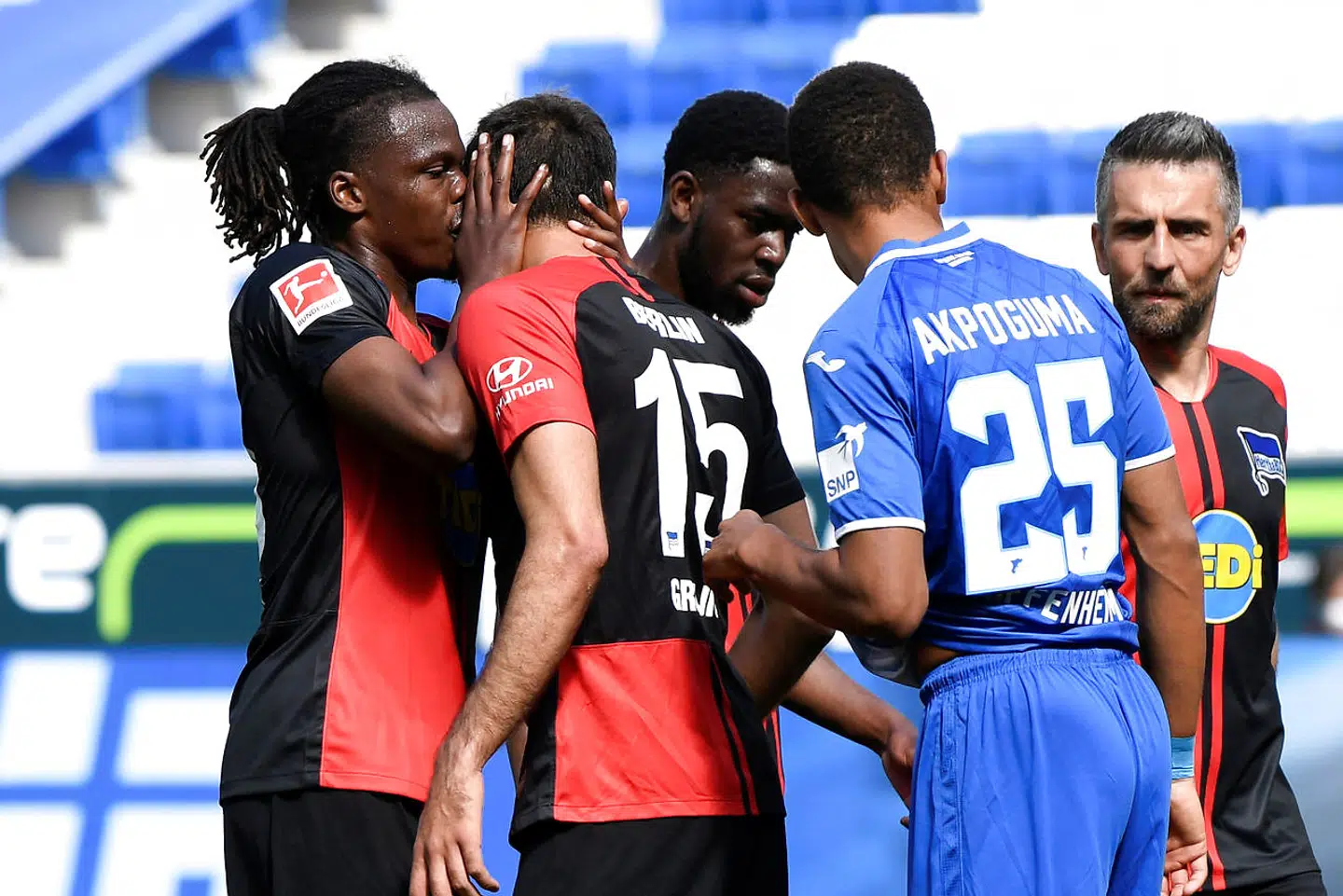 Soccer Football - Bundesliga - TSG 1899 Hoffenheim v Hertha BSC - PreZero Arena, Sinsheim, Germany - May 16, 2020 Hertha Berlin's Dedryck Boyata with Marko Grujic, as play resumes behind closed doors following the outbreak of the coronavirus disease (COVID-19) Thomas Kienzle/Pool via REUTERS DFL regulations prohibit any use of photographs as image sequences and/or quasi-video