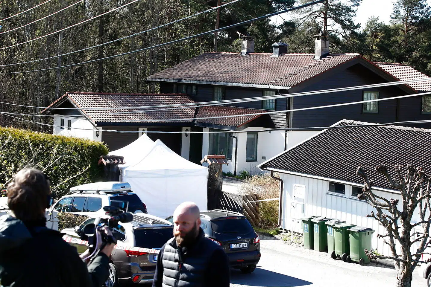 epa08402218 Police forensic experts have set up a tent over a basin on the property, of Tom Hagen, for further investigation in Lorenskog, Norway, 05 May 2020. Norwegian businessman Hagen was arrested on 28 April and charged with murder or complicity in the murder of his wife Anne-Elisabeth Hagen who has been missing for a year and a half. EPA/TERJE PEDERSEN NORWAY OUT