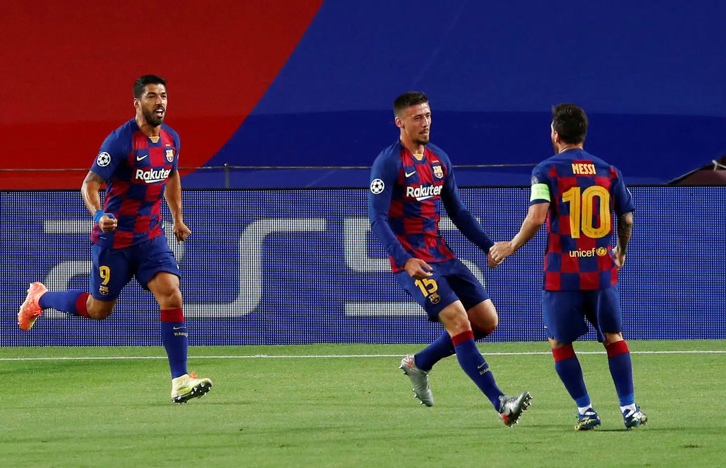 Soccer Football - Champions League - Round of 16 Second Leg - FC Barcelona v Napoli - Camp Nou, Barcelona, Spain - August 8, 2020 Barcelona's Clement Lenglet celebrates scoring their first goal with Lionel Messi and Luis Suarez, as play resumes behind closed doors following the outbreak of the coronavirus disease (COVID-19) REUTERS/Albert Gea