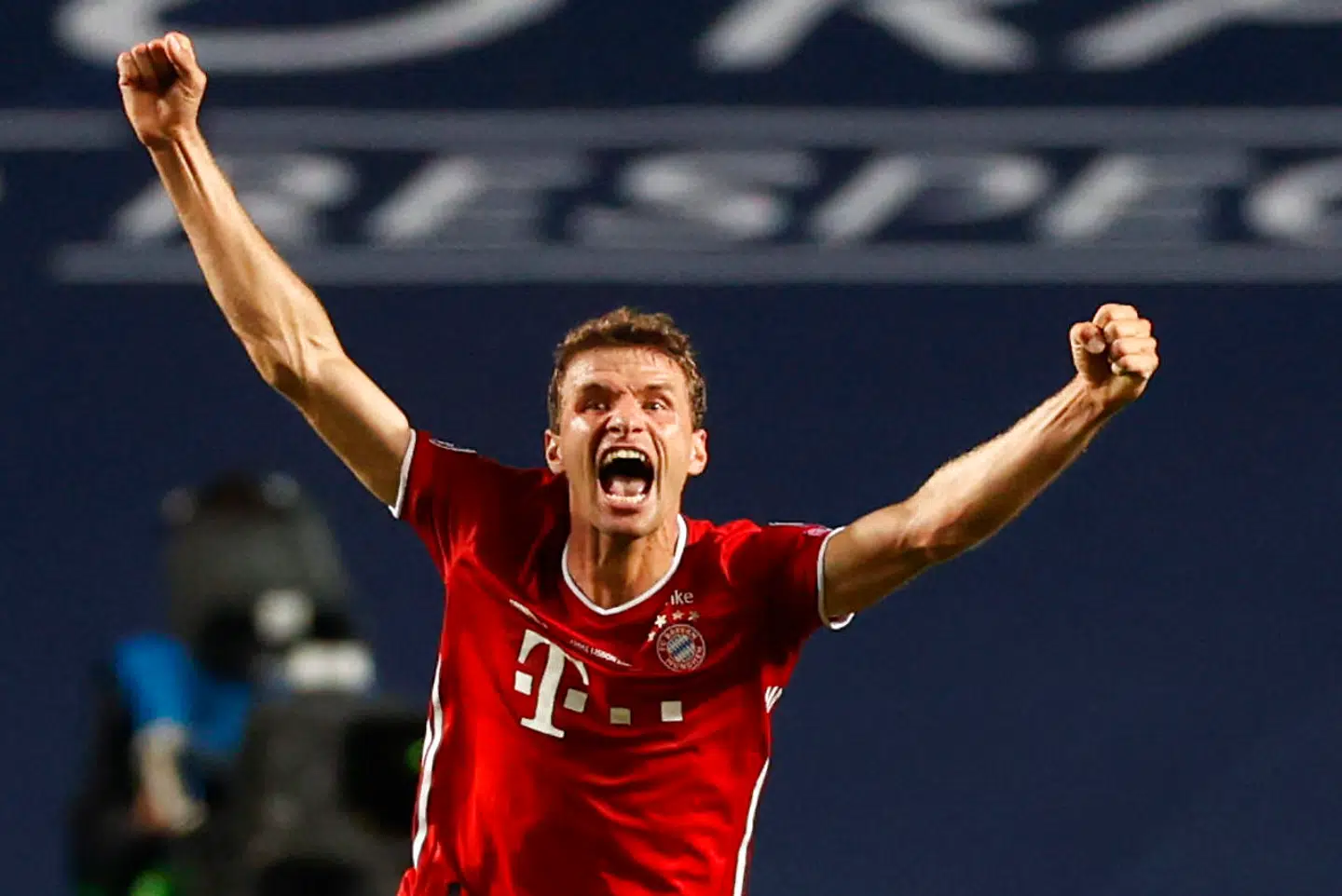 Bayern Munich's German forward Thomas Mueller celebrates after winning at the end of the UEFA Champions League final football match between Paris Saint-Germain and Bayern Munich at the Luz stadium in Lisbon on August 23, 2020. (Photo by MATTHEW CHILDS / POOL / AFP)