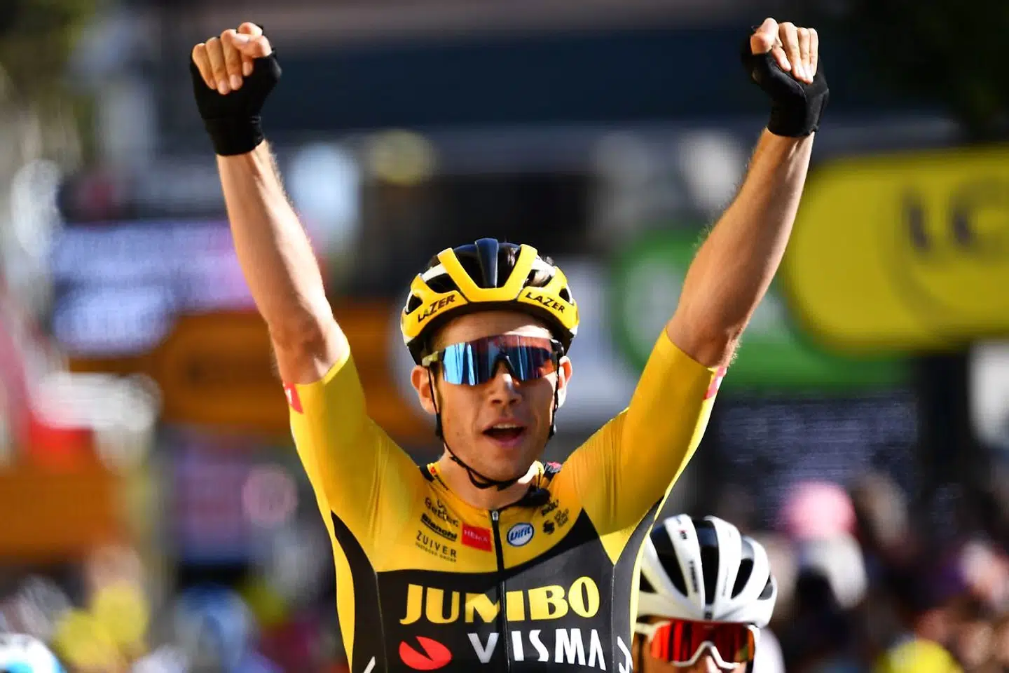 Stage winner Team Jumbo rider Belgium's Wout van Aert celebrates as he crosses the finish line at the end of the 7th stage of the 107th edition of the Tour de France cycling race, 168 km between Millau and Lavaur, on September 4, 2020. (Photo by Stuart Franklin / POOL / AFP)