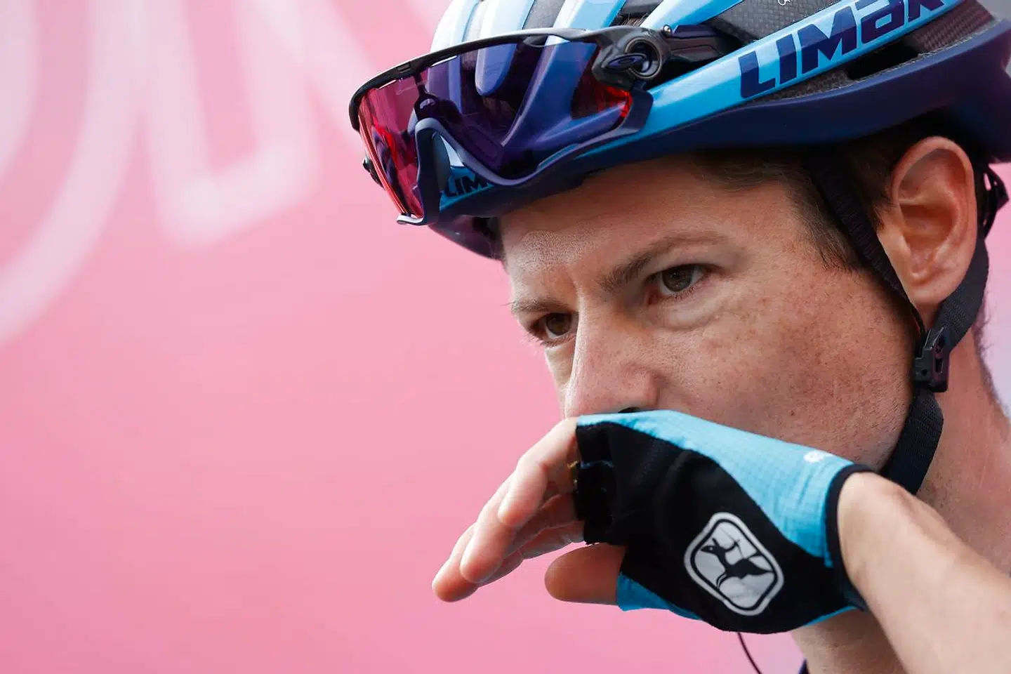 Team Astana rider Denmark's Jakob Diemer Fuglsang stands on the podium before the start of the 5th stage of the Giro d'Italia 2020 cycling race, a 140-kilometer route between Mileto and Camigliatello Silano, on October 7, 2020 in Mileto. (Photo by Luca Bettini / AFP)