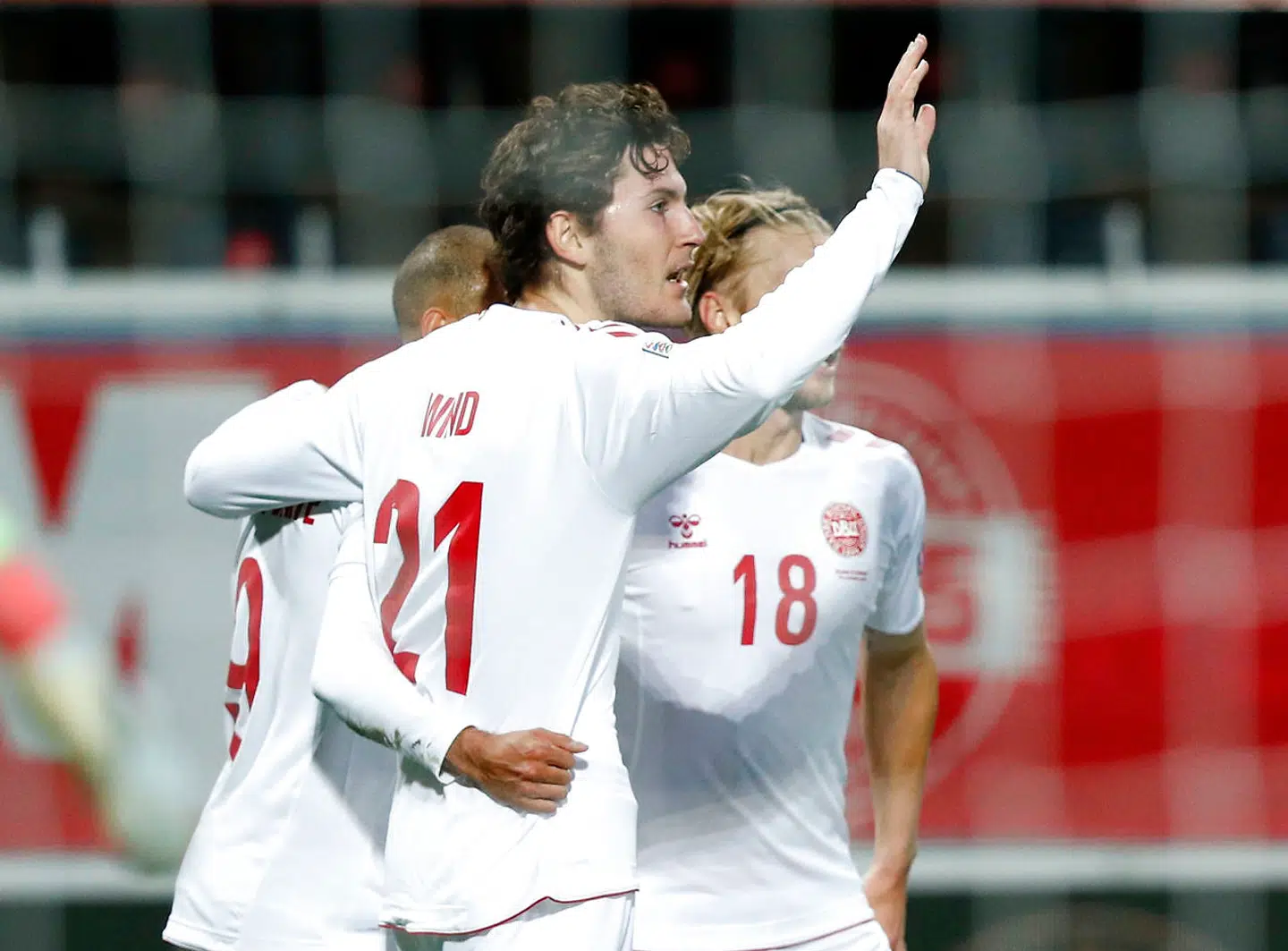 Soccer Football - UEFA Nations League - League A - Group 2 - Belgium v Denmark - King Power Stadion At Den Dreef, Leuven, Belgium - November 18, 2020 Denmark's Jonas Wind celebrates scoring their first goal with teammates REUTERS/Francois Lenoir
