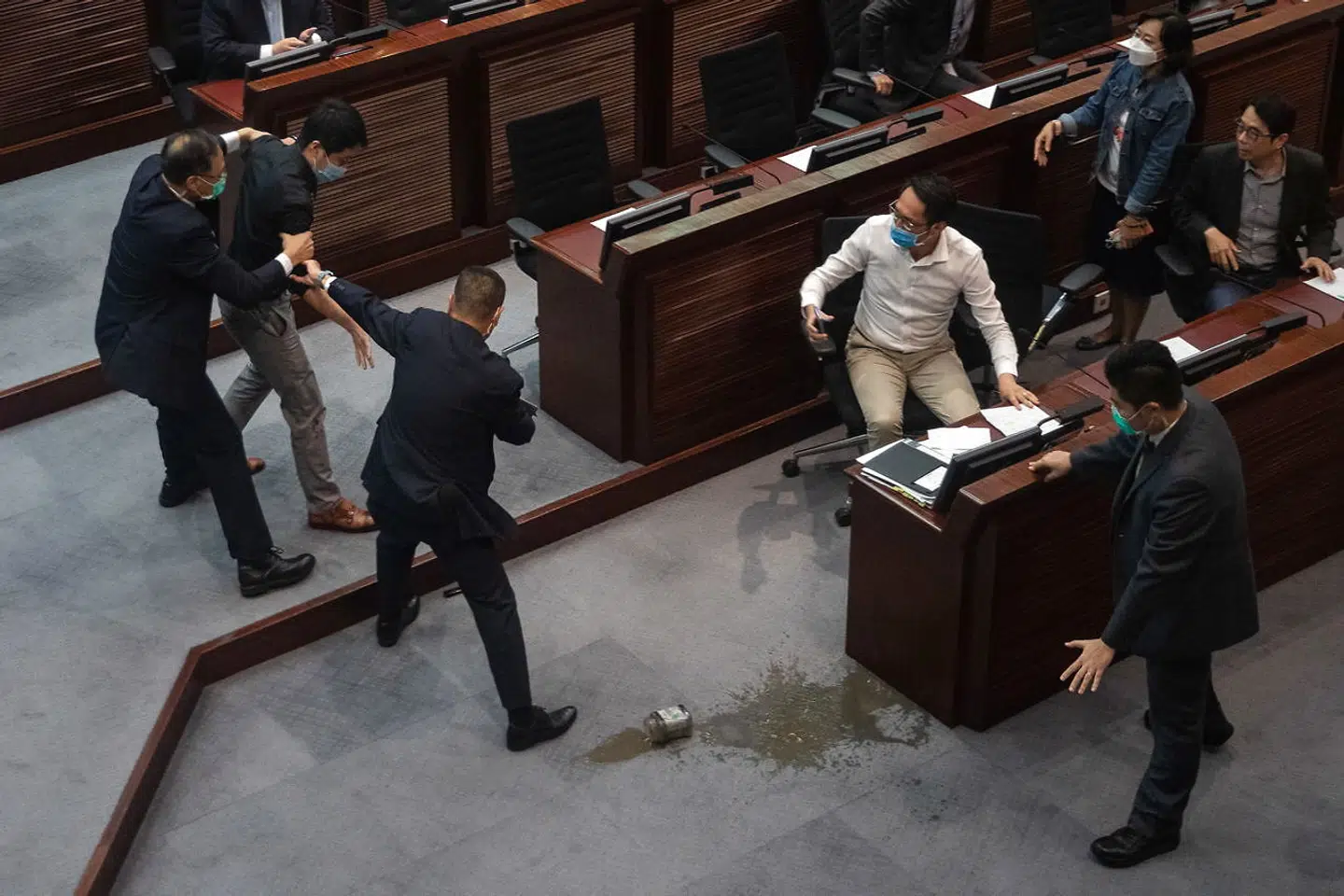 Ted Huis navn gik verden rundt, da han kastede en stinkbombe ud i parlamentssalen i Hong Kong. EPA/JEROME FAVRE