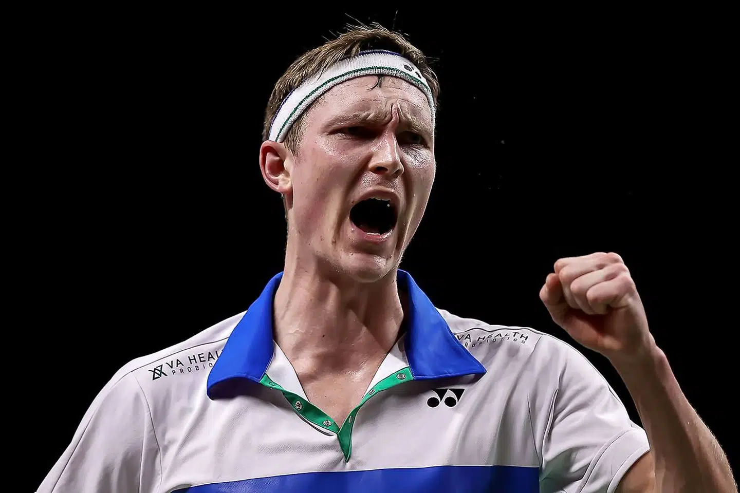 This handout from the Badminton Association of Thailand taken and released on January 16, 2021 shows Denmark's Viktor Axelsen reacting against Indonesia's Anthony Sinisuka Ginting during their men's singles semi-finla match at the Thailand Open badminton tournament in Bangkok. (Photo by Handout / various sources / AFP) / - - - - -EDITORS NOTE - - - RESTRICTED TO EDITORIAL USE - CREDIT "AFP PHOTO / BADMINTON ASSOCIATION OF THAILAND " - NO MARKETING - NO ADVERTISING CAMPAIGNS - DISTRIBUTED AS A SERVICE TO CLIENTS