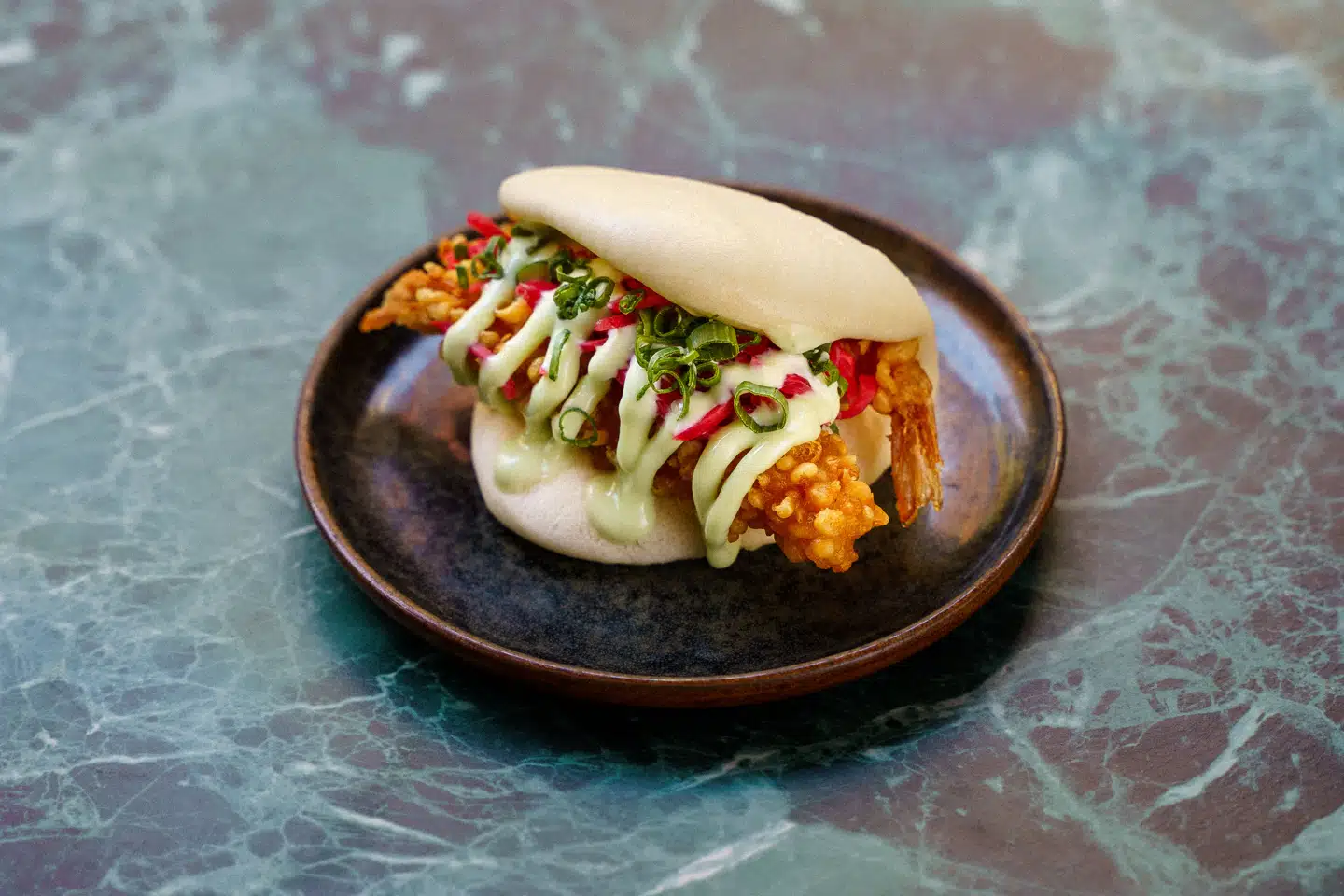 De dampede boller, bao, er en af de vietnamesiske specialiteter, der er på menukortet.