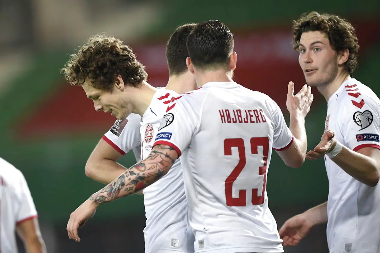 epa09109363 Players of Austria celebrate their 1-0 lead during the FIFA World Cup 2022 qualifying soccer match between Austria and Denmark in Vienna, Austria, 31 March 2021. EPA/Christian Bruna