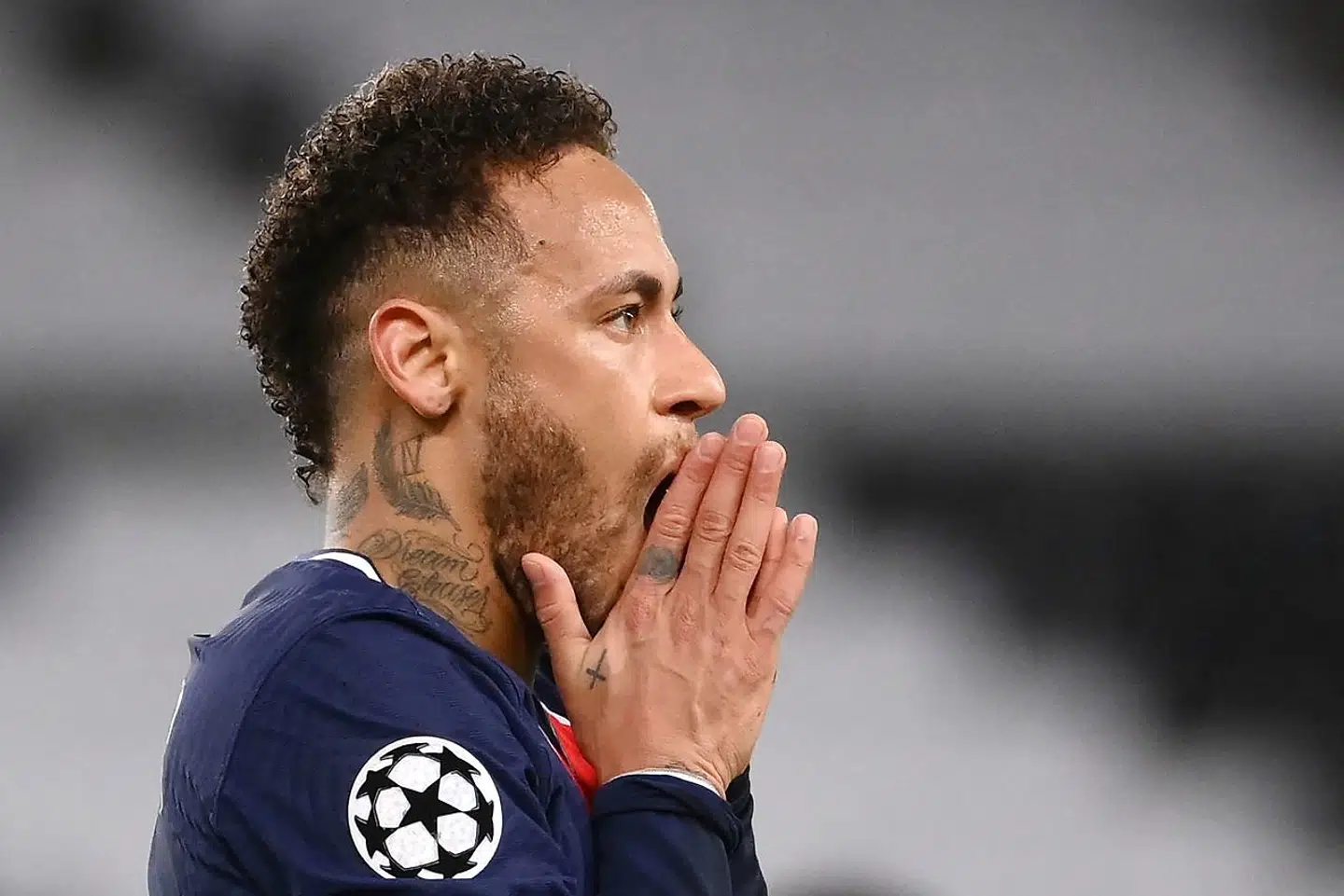 Paris Saint-Germain's Brazilian forward Neymar reacts during the UEFA Champions League quarter-final second leg football match between Paris Saint-Germain (PSG) and FC Bayern Munich at the Parc des Princes stadium in Paris, on April 13, 2021. (Photo by FRANCK FIFE / AFP)