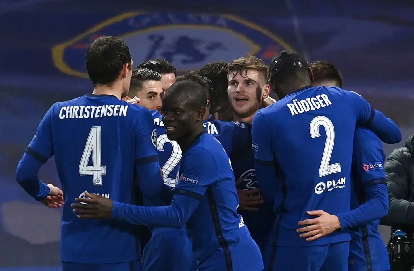 Chelsea's German striker Timo Werner is mobbed by teammates after scoring the opening goal during the UEFA Champions League second leg semi-final football match between Chelsea and Real Madrid at Stamford Bridge in London on May 5, 2021. (Photo by Glyn KIRK / AFP)