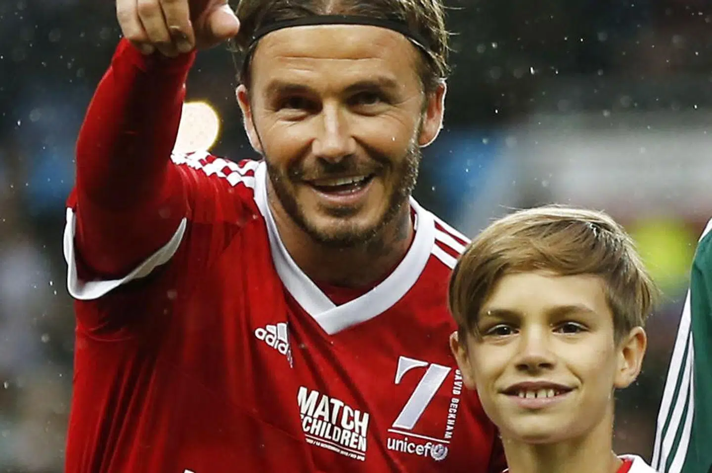 Romea Beckham med sin far, da han var yngre.
