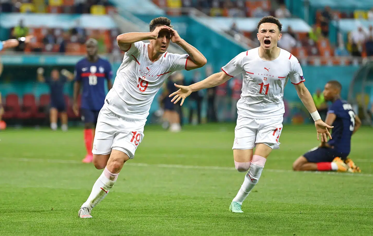 Soccer Football - Euro 2020 - Round of 16 - France v Switzerland - National Arena Bucharest, Bucharest, Romania - June 28, 2021 Mario Gavranovic celebrates scoring their third goal with Ruben Vargas Pool via REUTERS/Justin Setterfield