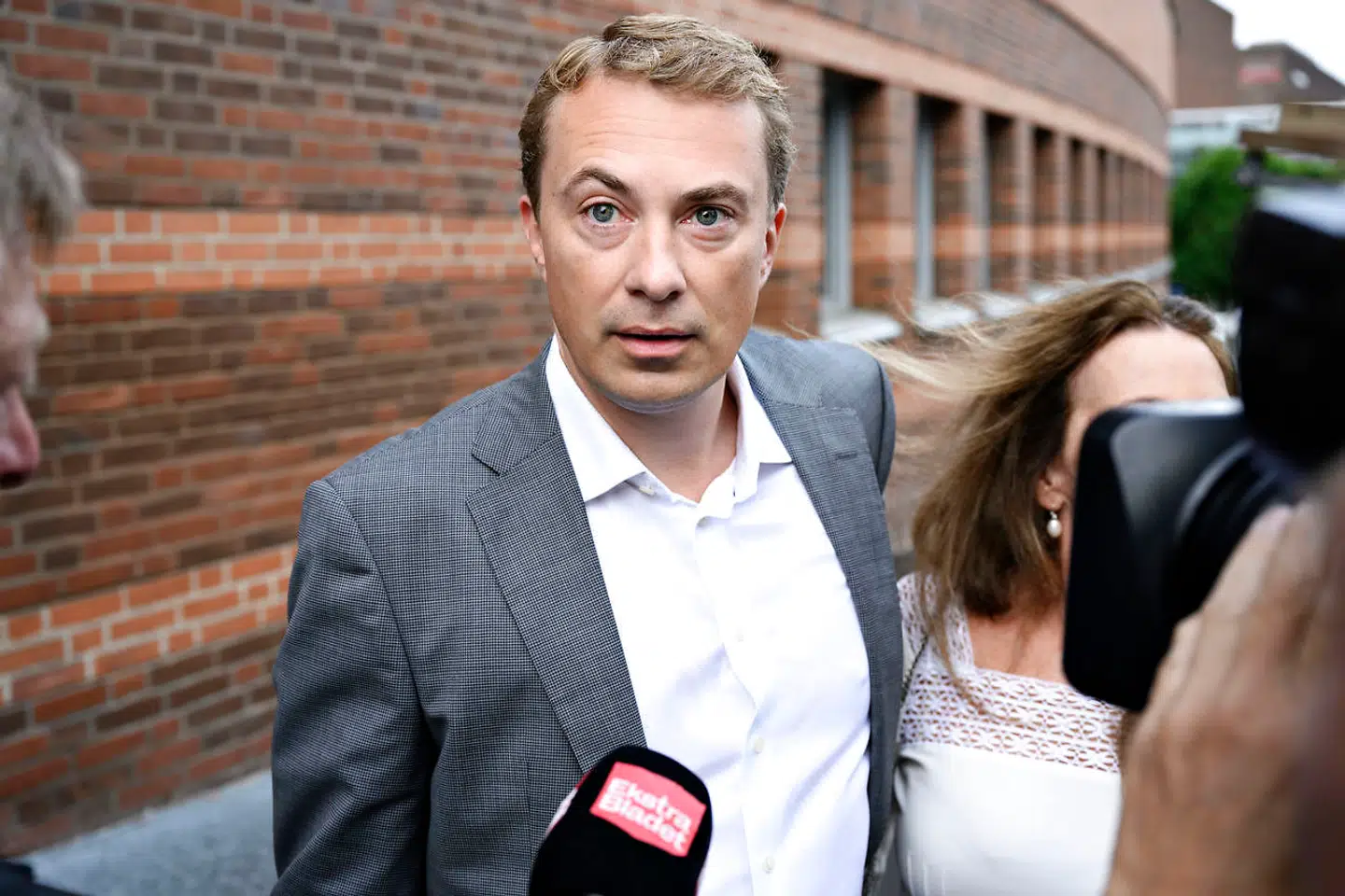 The Danish People's Party's deputy chairman Morten Messerschmidt arrives with his girlfriend Dot Wessman for the first hearing in court in Lyngby, Monday 2 August 2021. Morten Messerschmidt, the MP who serves as vice-chair of the Danish People's Party, goes on trial for fraud, forgery and misuse of EU funds. (Photo: Philip Davali / Ritzau Scanpix)