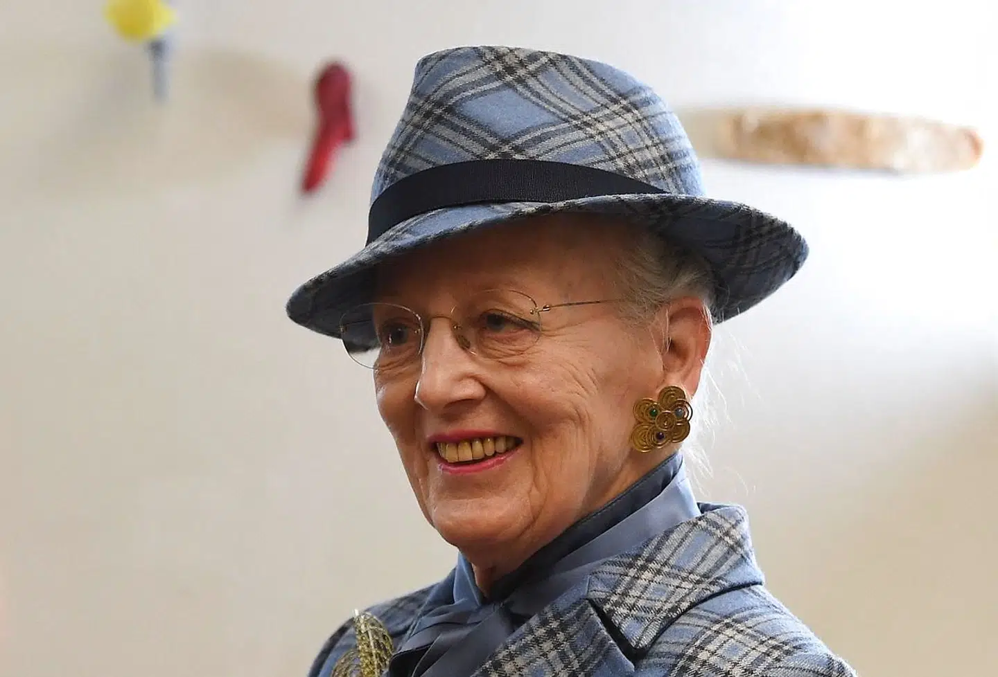 Queen Margrethe II of Denmark sits in a workshop studio prior a final statement for journalists during her visit in the Akademie der Bildenden Kuenste (academy of fine arts) in Munich, southern Germany, on November 13, 2021. (Photo by Christof STACHE / AFP)