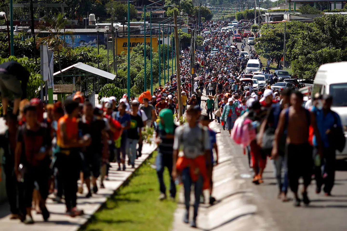 Central American migrants walk along the highway near the border with Guatemala, as they continue their journey trying to reach the U.S., in Tapachula, Mexico October 21, 2018. REUTERS/Ueslei Marcelino TPX IMAGES OF THE DAY