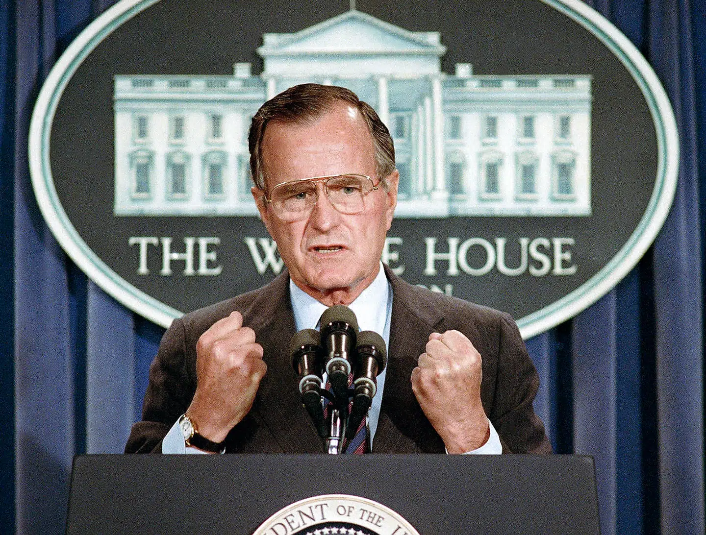 FILE - In this June 5, 1989 file photo, U.S. President George H.W. Bush holds a news conference at the White House in Washington where he condemned the Chinese crackdown on pro-democracy demonstrators in Beijing's Tiananmen Square. Bush died at the age of 94 on Friday, Nov. 30, 2018, about eight months after the death of his wife, Barbara Bush. (AP Photo/Marcy Nighswander, File)