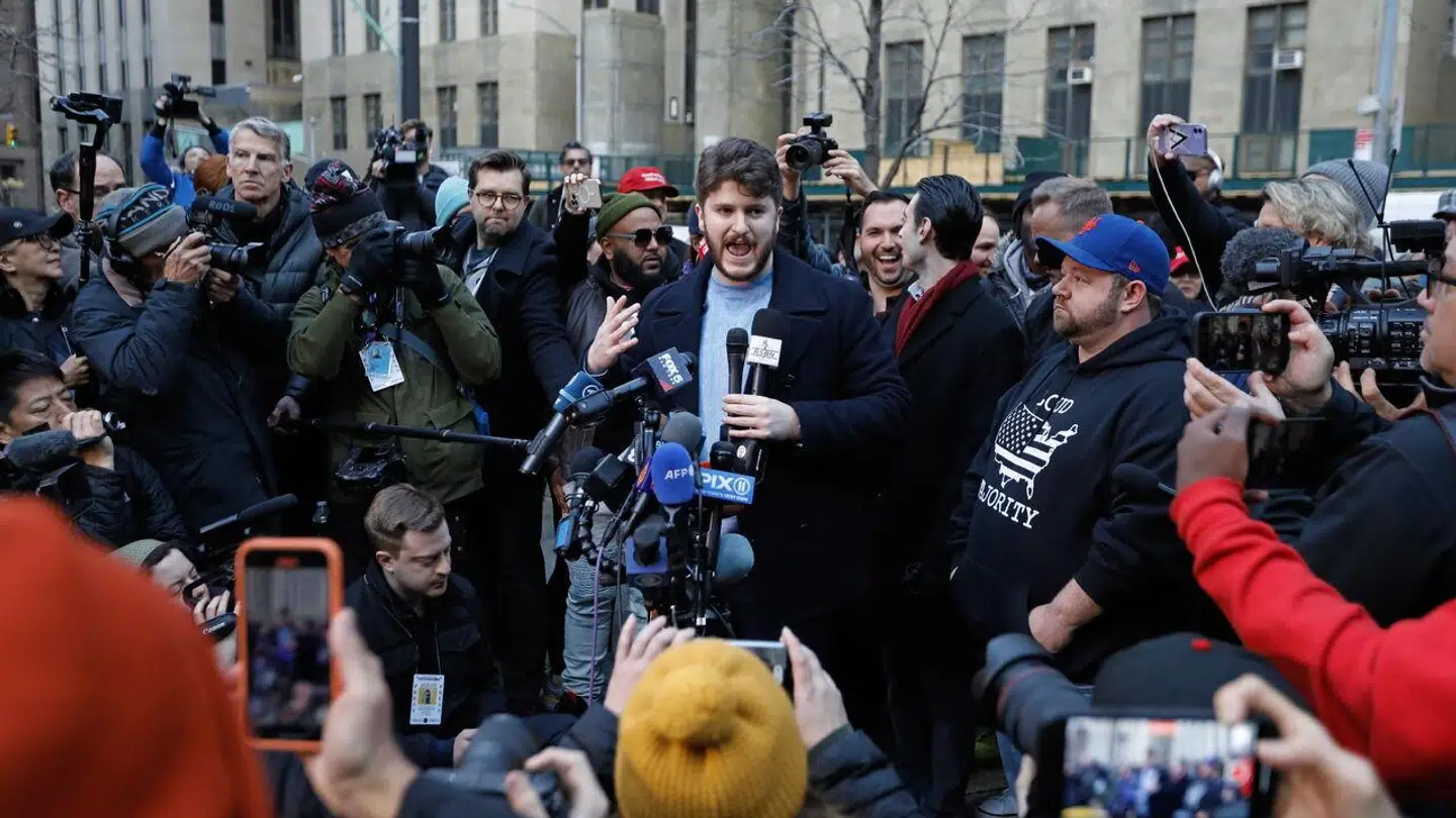 epa10534372 Gavin Wax (C) president of the New York Young Republicans speaks outside of New York Criminal Court at a rally for Former President Donald Trump in New York, New York, USA, 20 March 2023. Former President Donald J. Trump posted on his social media platform that he expects to be formally indicted on 21 March, the Manhattan District Attorney's office investigating charges related to hush-money payments to porn star Stormy Daniels has declined to comment on any potential indictment. EPA/Peter Foley