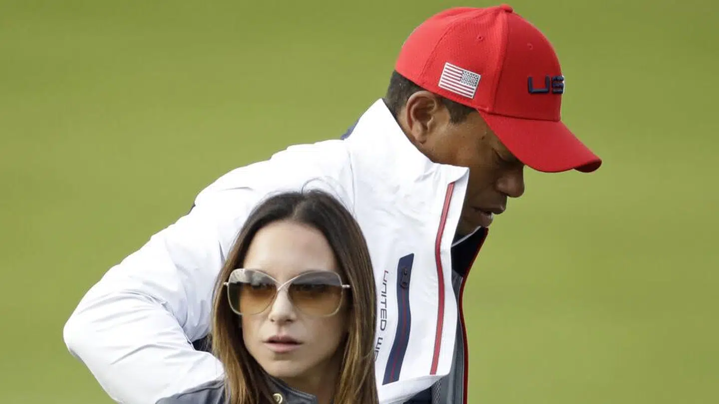Erica Herman hiver Tiger Woods i retten.