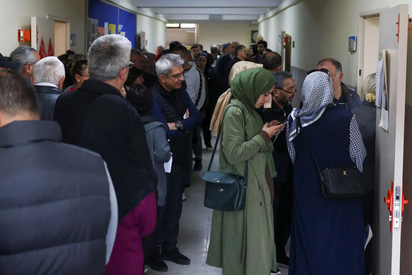 People attend the Turkish presidential and parliamentary elections at a polling station in Ankara, Turkey May 14, 2023. REUTERS/Cagla Gurdogan