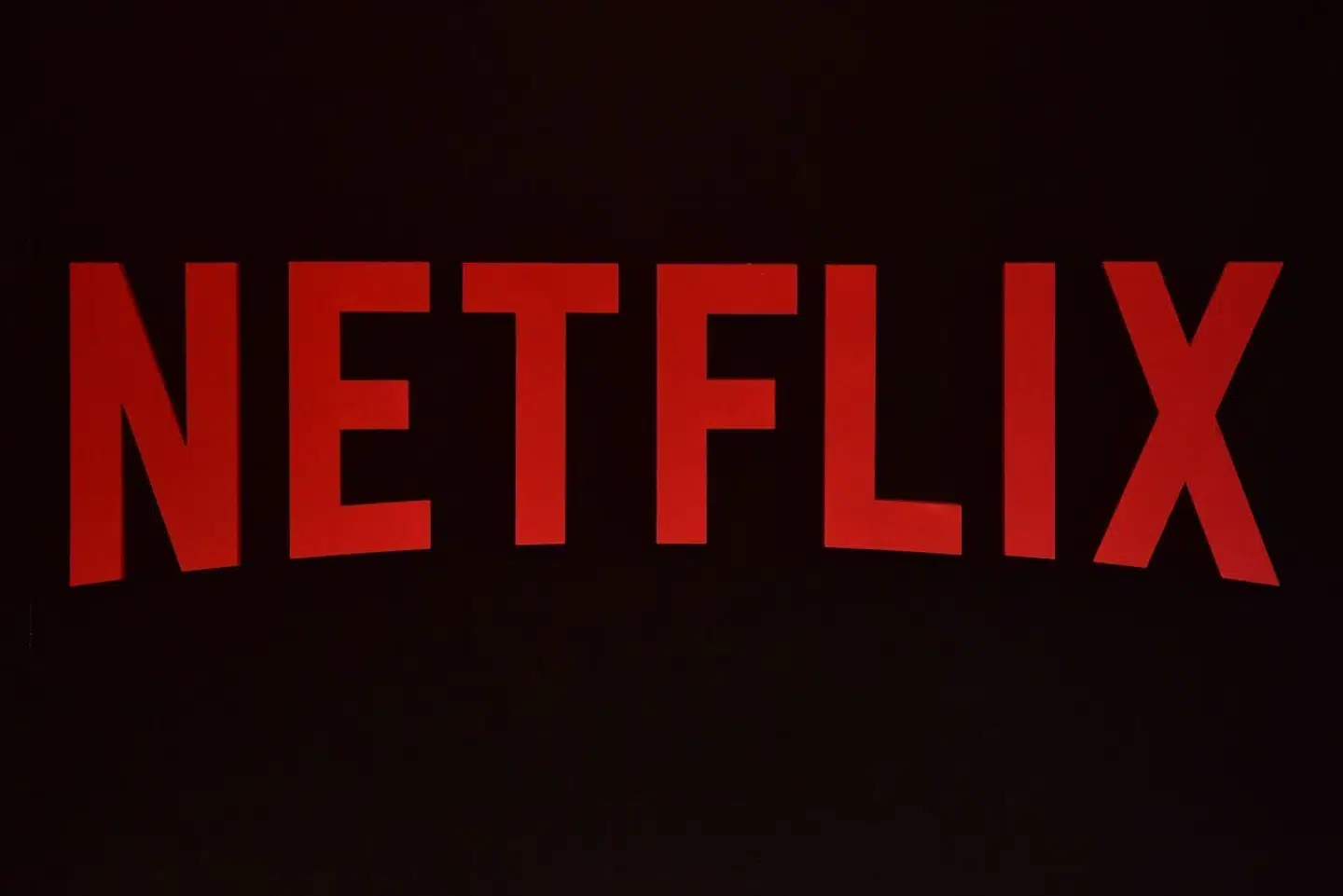 (FILES) In this file photo taken on March 01, 2017 The Netflix logo is pictured during a Netflix event on March 1, 2017 in Berlin. Netflix sacked its chief spokesman Jonathan Friedland, he revealed on Friday, June 22, 2018, after he used the N-word twice in the space of a few days during meetings with staff. / AFP PHOTO / John MACDOUGALL