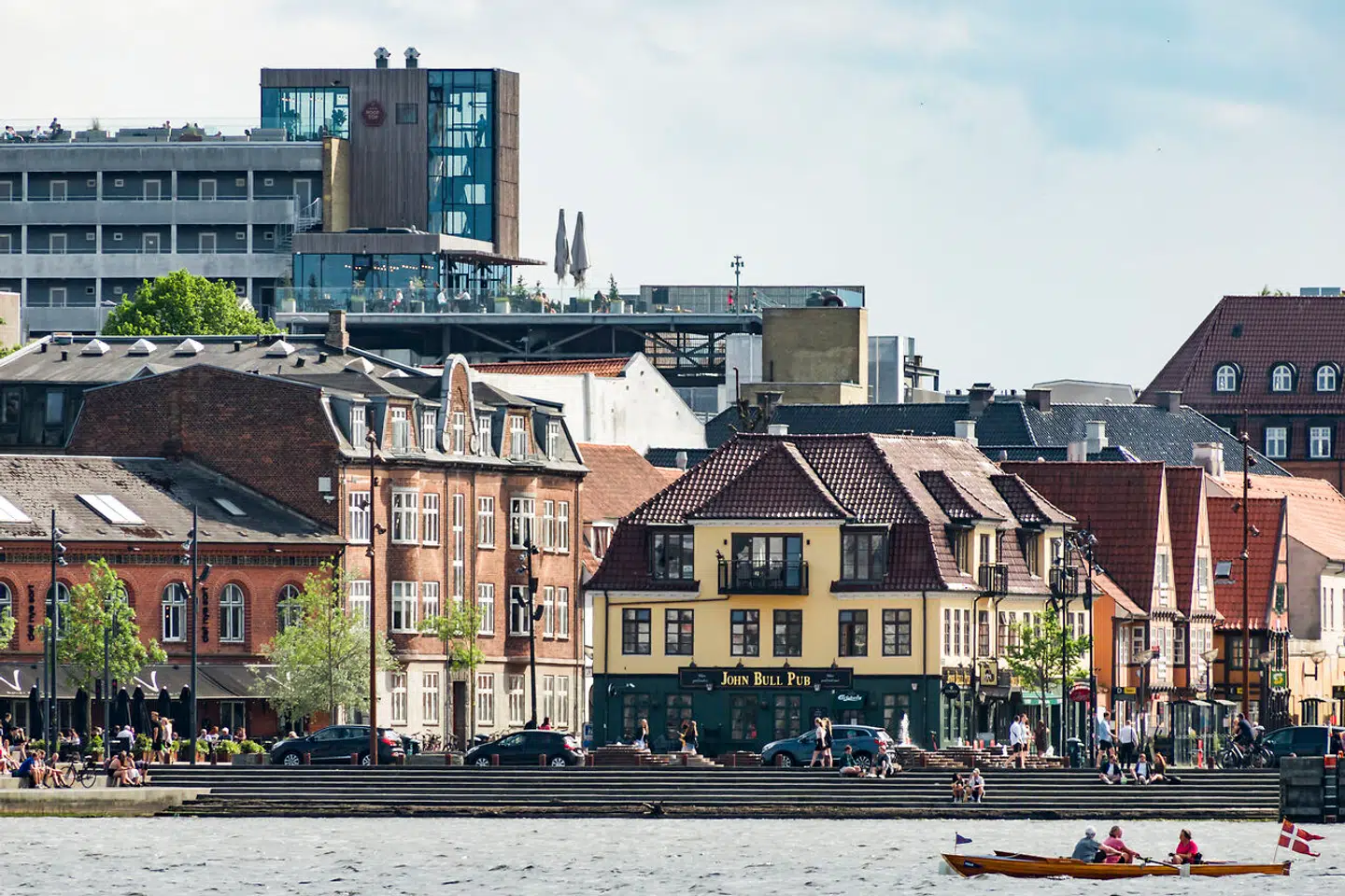 Aalborg, Denmark People kayaking in the harbour area outside the downtown. | usage worldwide Photo by: Alexander Farnsworth/picture-alliance/dpa/AP Images