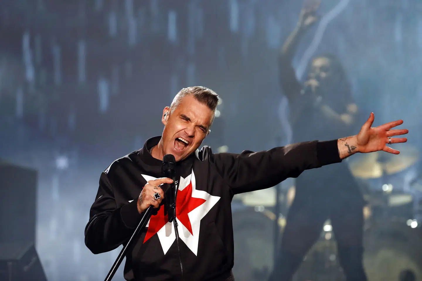Robbie Williams har for nylig kunnet fejre 25 år som soloartist. Det blev i september markeret med albummet XXV, der strøg ind på den britiske hitliste. Til sommer optræder han på festivalen Heartland i Danmark. (Arkivfoto). Eduardo Verdugo/Ritzau Scanpix