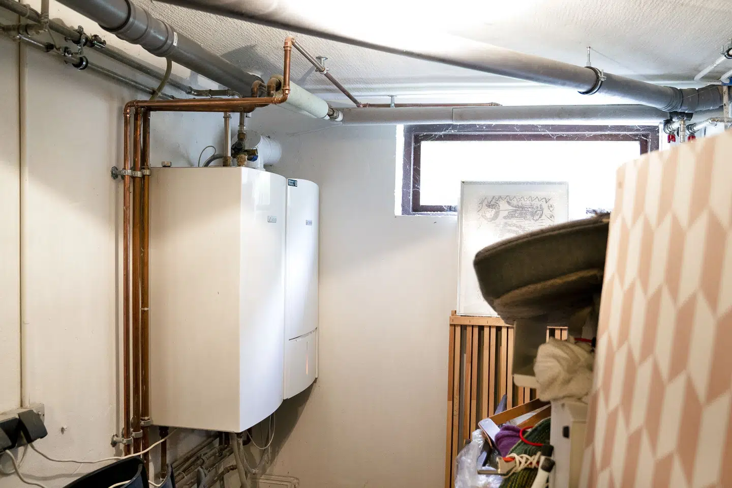 Sparerådene lyder blandt andet på at sænke temperaturen, at bruge mindre varmt vand, og at få serviceret sit gasfyr. Liselotte Sabroe/Ritzau Scanpix