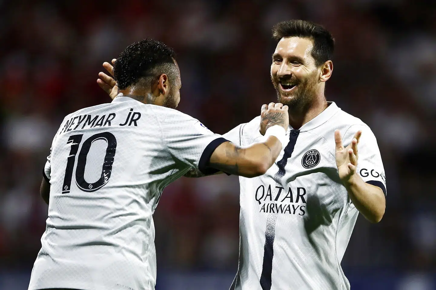 epa10109359 Paris Saint-Germain's Lionel Messi (R) celebrates with teammate Neymar (L) after scoring the 4-0 lead during the French Ligue 1 soccer match between Clermont Foot 63 and Paris Saint-Germain (PSG) in Clermont-Ferrand, France, 06 August 2022. EPA/Mohammed Badra
