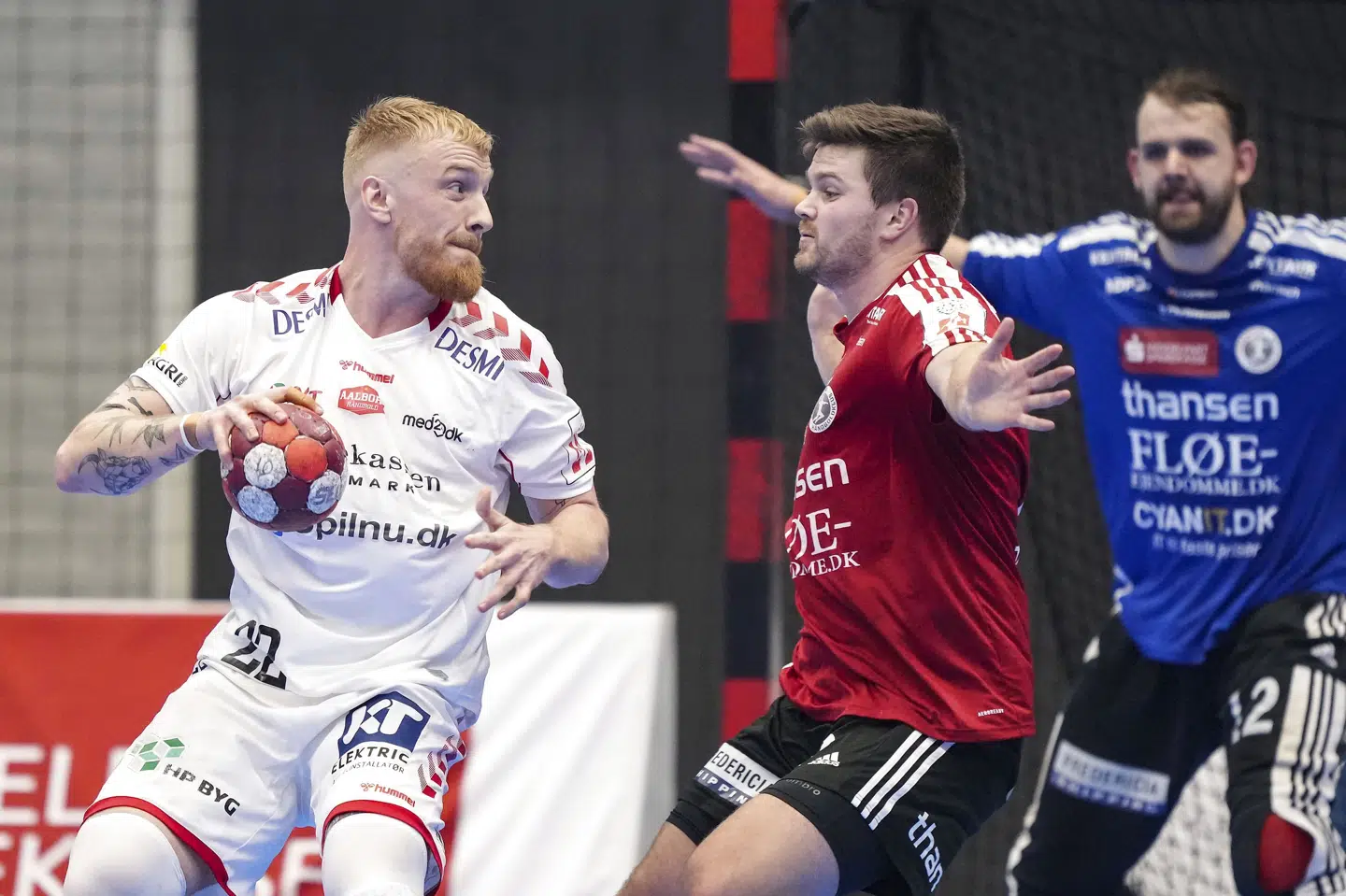Rasmus Boysen (i rød trøje i midten) regner med, at karrieren som professionel er forbi. (Arkivfoto). Claus Fisker/Ritzau Scanpix