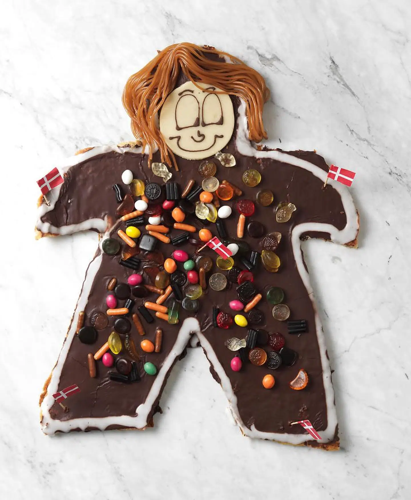 Traditionelt har en kagemand ofte været udstyret med bukser og hår til den korte side som på billedet, men tiderne skifter, og kunderne har ofte flere og flere ideer til, hvordan bagværket kan gøres mere personligt.