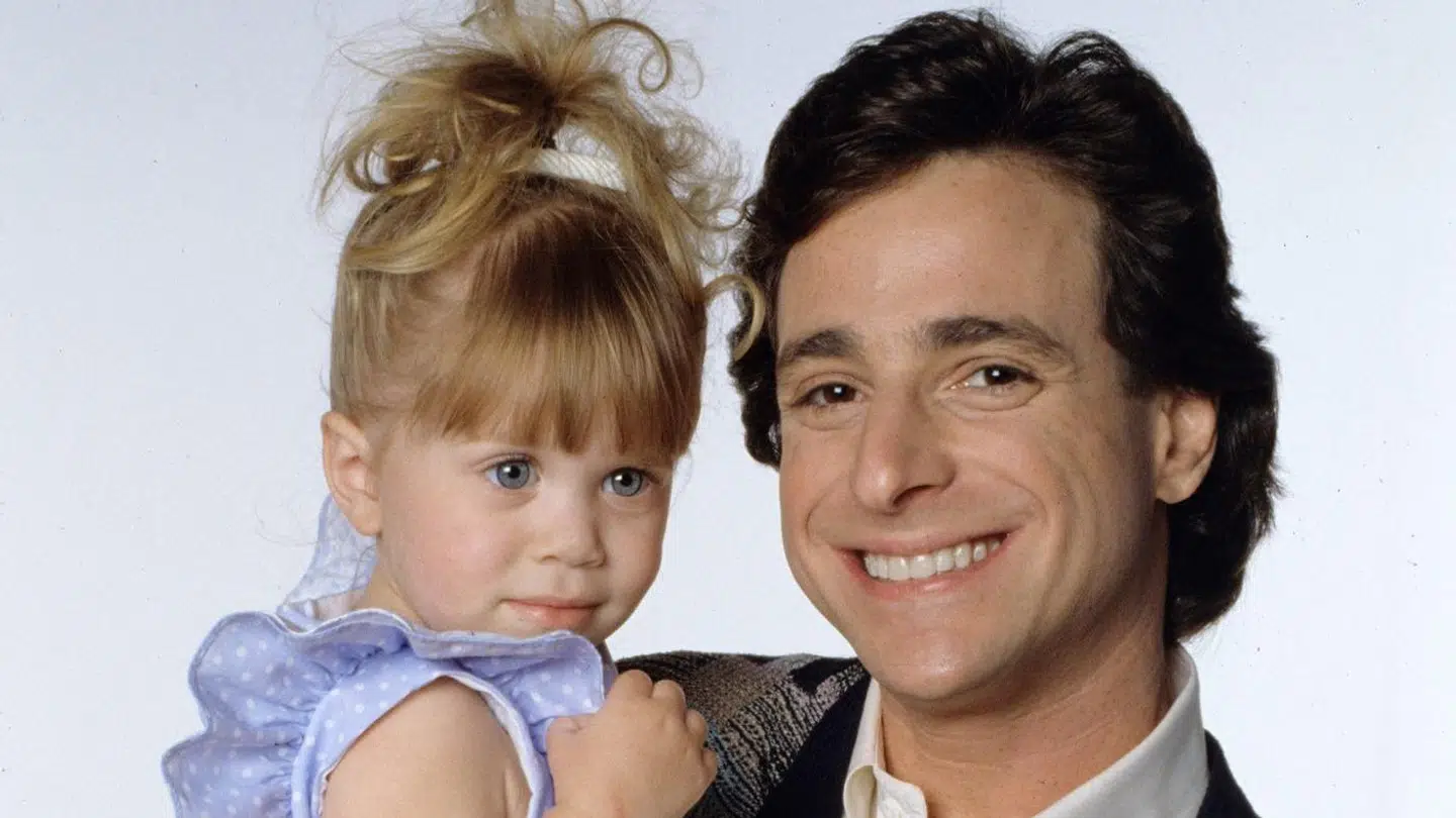 Mary-Kate og Ashley Olsen spillede på skifte den mindste datter Michelle. Bob Saget var faren i 'Full House'.