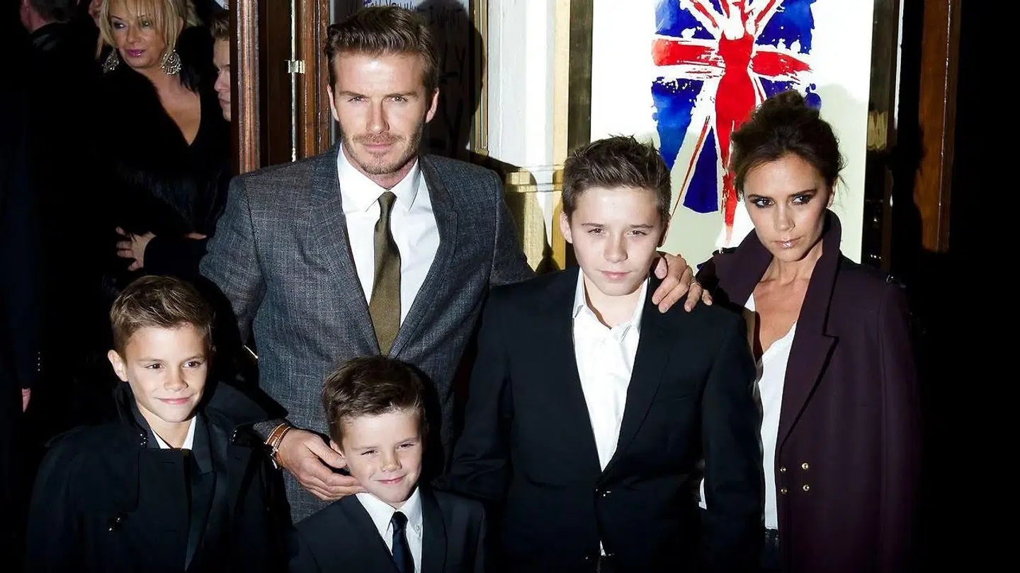David og Victoria Beckham med deres dengang tre sønner. Siden har de også fået en datter.