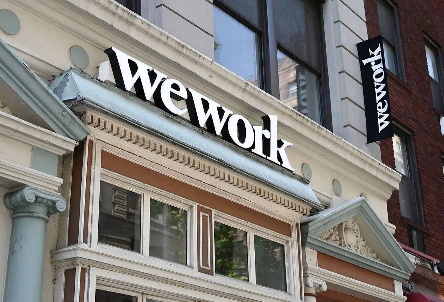 (FILES) In this file photo taken on July 19, 2019 a WeWork office is seen in New York City. - Adam Neumann, the whimsical founder of WeWork, is worth "only" $600 million, compared to $4.1 billion a few months ago, according to Forbes magazine. (Photo by TIMOTHY A. CLARY / AFP)