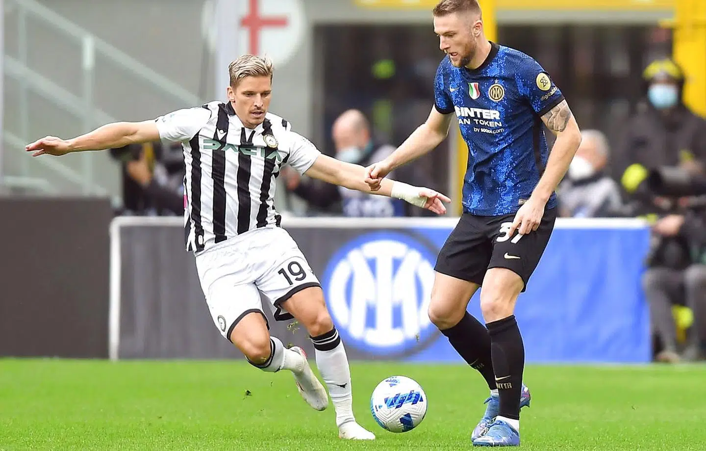 Soccer Football - Serie A - Inter Milan v Udinese - San Siro, Milan, Italy - October 31, 2021 Inter Milan's Milan Skriniar in action with Udinese's Jens Stryger Larsen REUTERS/Daniele Mascolo