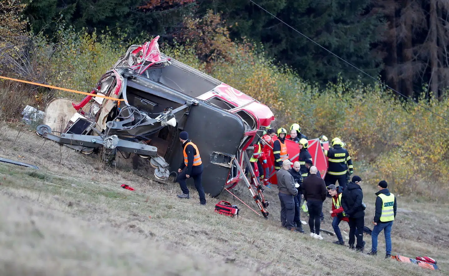 Police and rescue service members are seen near the crashed cable car in Liberec, Czech Republic, October 31, 2021. REUTERS/David W Cerny