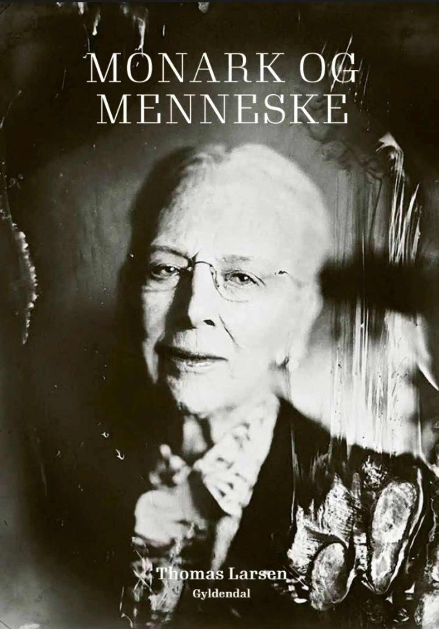 Fosiden til bogen 'Monark og menneske' af Thomas Larsen.