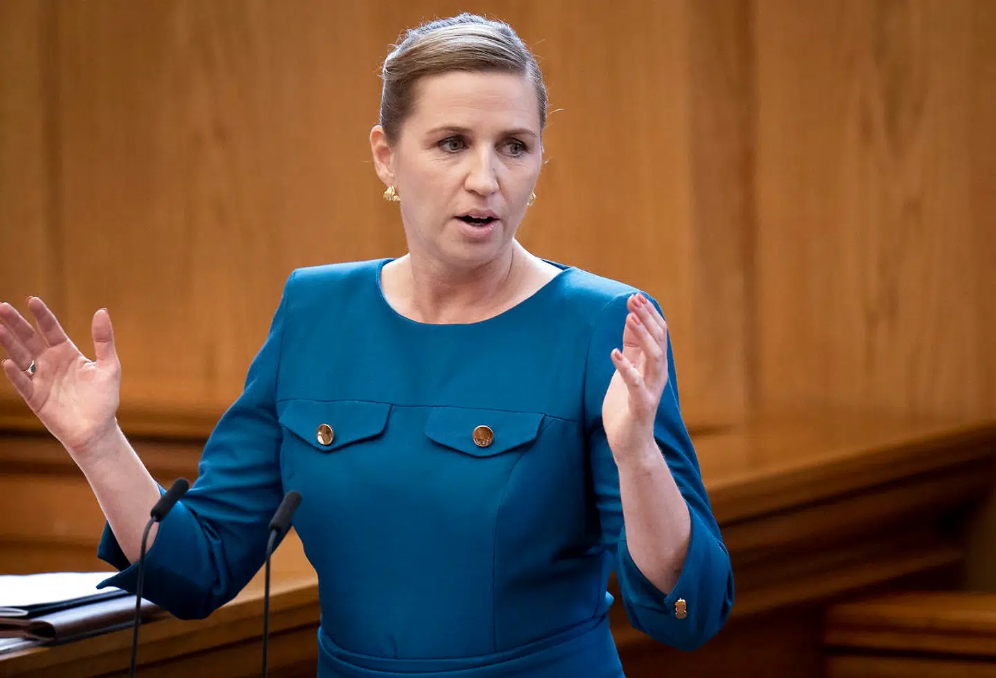 Prime Minister Mette Frederiksen peaks during the opening of the Danish Parliament Folketinget in Copenhagen on Tuesday 5 October 2021. (Photo: Liselotte Sabroe / Ritzau Scanpix)