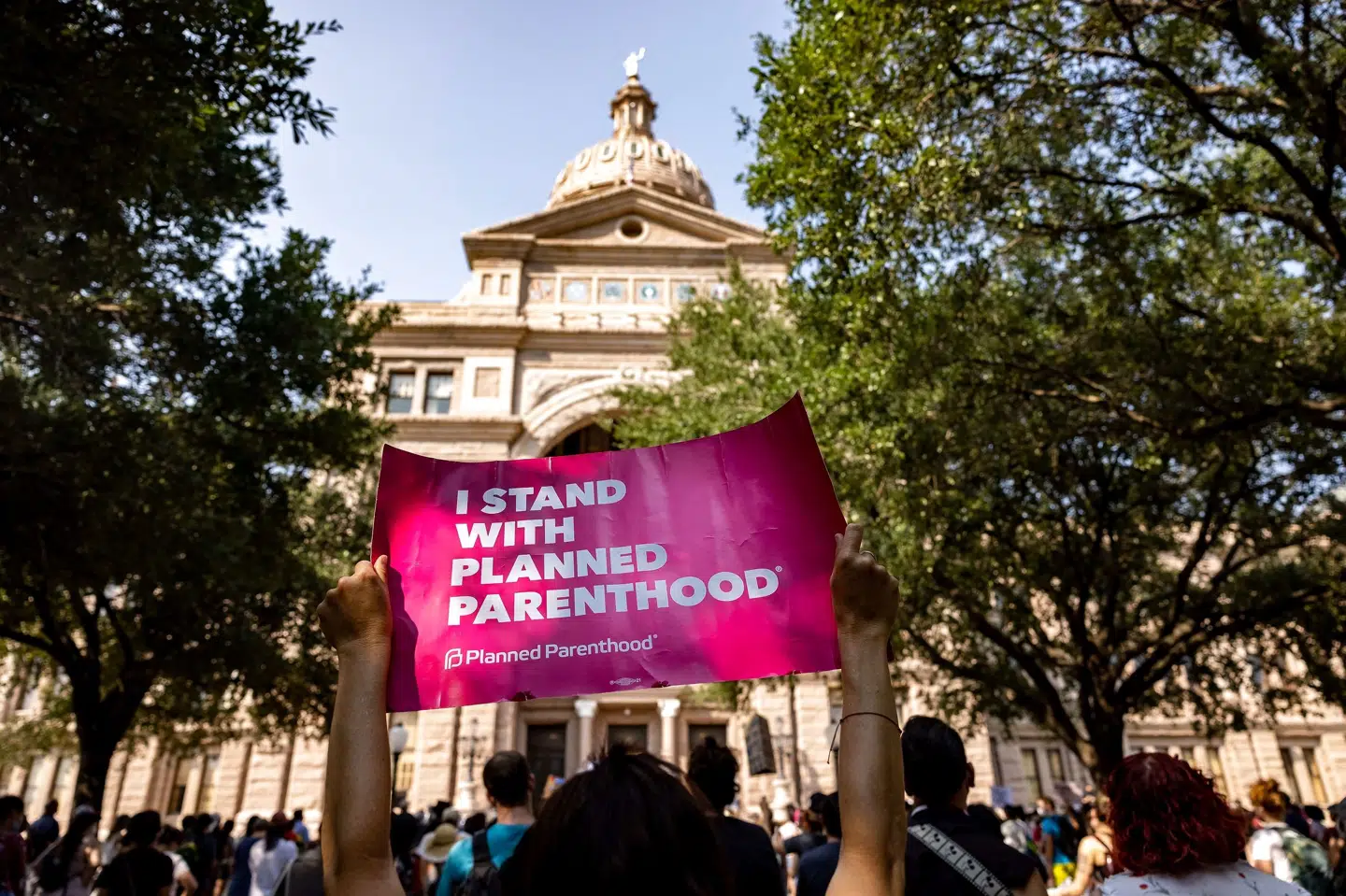 Demonstranter i den texanske hovedstad, Austin, udtrykker deres utilfredshed med delstatens strenge abortlovgivning. (Arkivfoto) Jordan Vonderhaar/Ritzau Scanpix