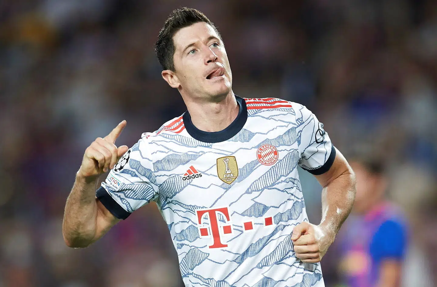 epa09468680 Bayern Munich's Robert Lewandowski celebrates after scoring the 0-2 lead during the UEFA Champions League Group E soccer match between FC Barcelona and Bayern Munich held at Camp Nou stadium, in Barcelona, Spain, 14 September 2021. EPA/Alejandro Garcia