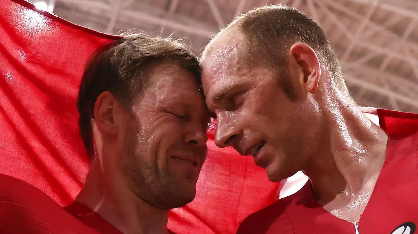 Lasse Norman Hansen (tv.) og Michael Mørkøv efter den store triumf.