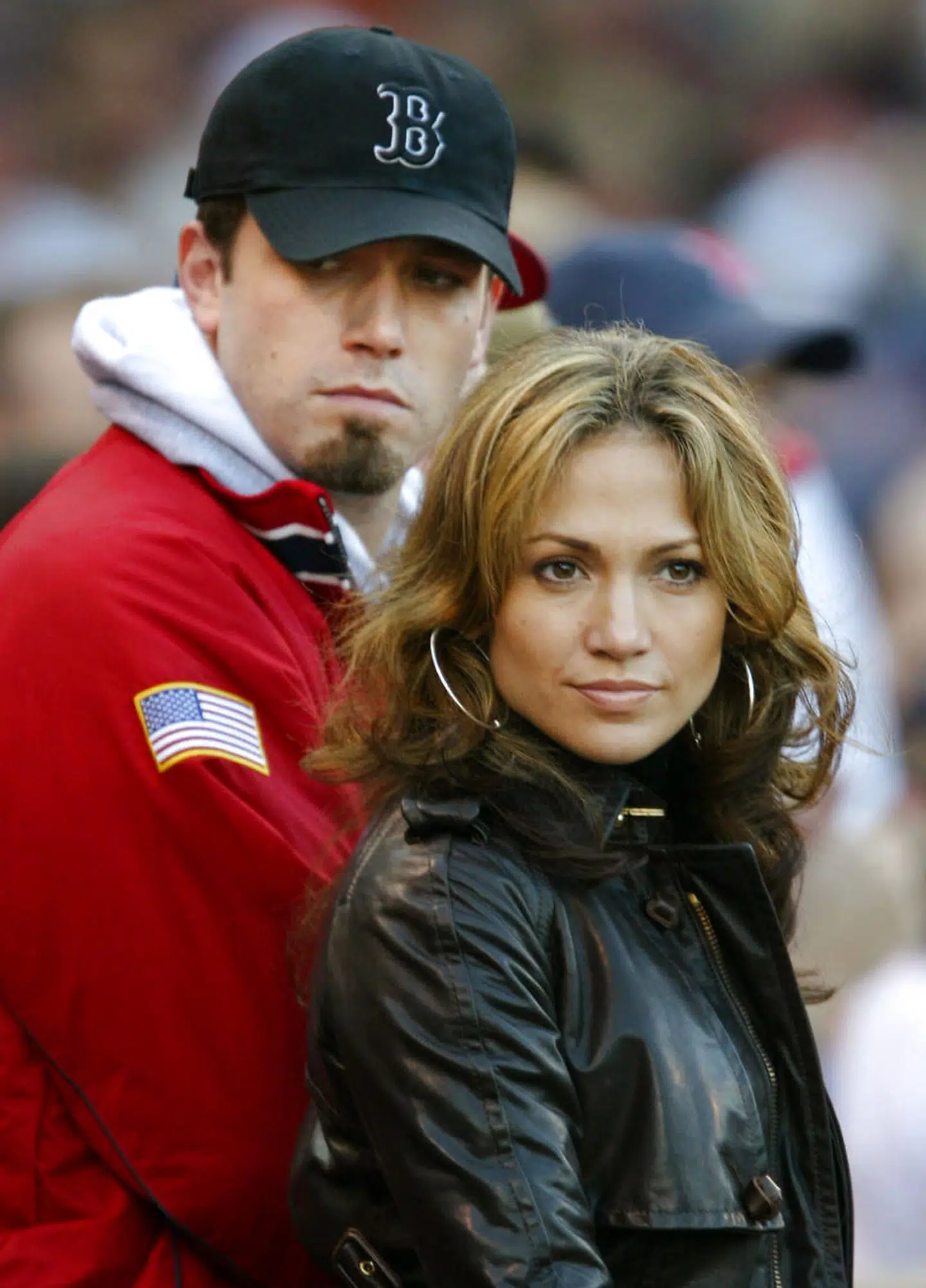 File ntertainers Jennifer Lopez and Ben Affleck are seen during an American League Championship series baseball game at Boston's Fenway Park, on October 11, 2003. The much ballyhooed engagement of movie stars Lopez and Affleck has been officially called off, a spokesman for the singer/actress said on January 22, 2004. The celebrity couple were supposed to marry last September but at the last minute called the wedding off, blaming the postponement on the media frenzy their planned nuptials had created. Since then they have been seen together in public many times, although there were widespread rumors that they were splitting up. REUTERS/Mike Segar/FILE
