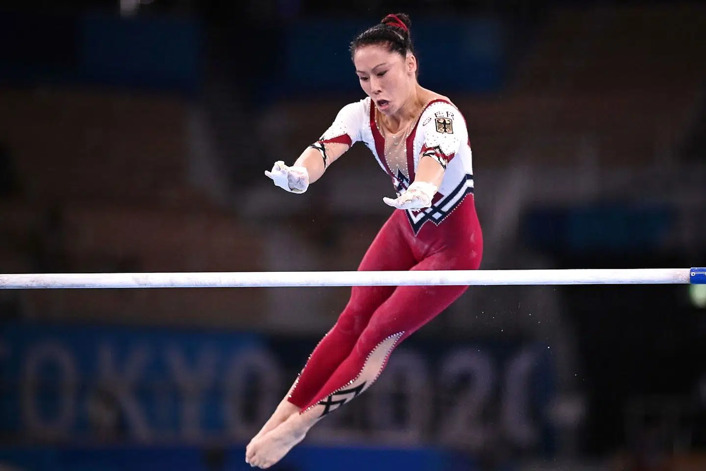 Germany's Kim Bui competes in the uneven bars event of the artistic gymnastics women's qualification during the Tokyo 2020 Olympic Games at the Ariake Gymnastics Centre in Tokyo on July 25, 2021. (Photo by Martin BUREAU / AFP)
