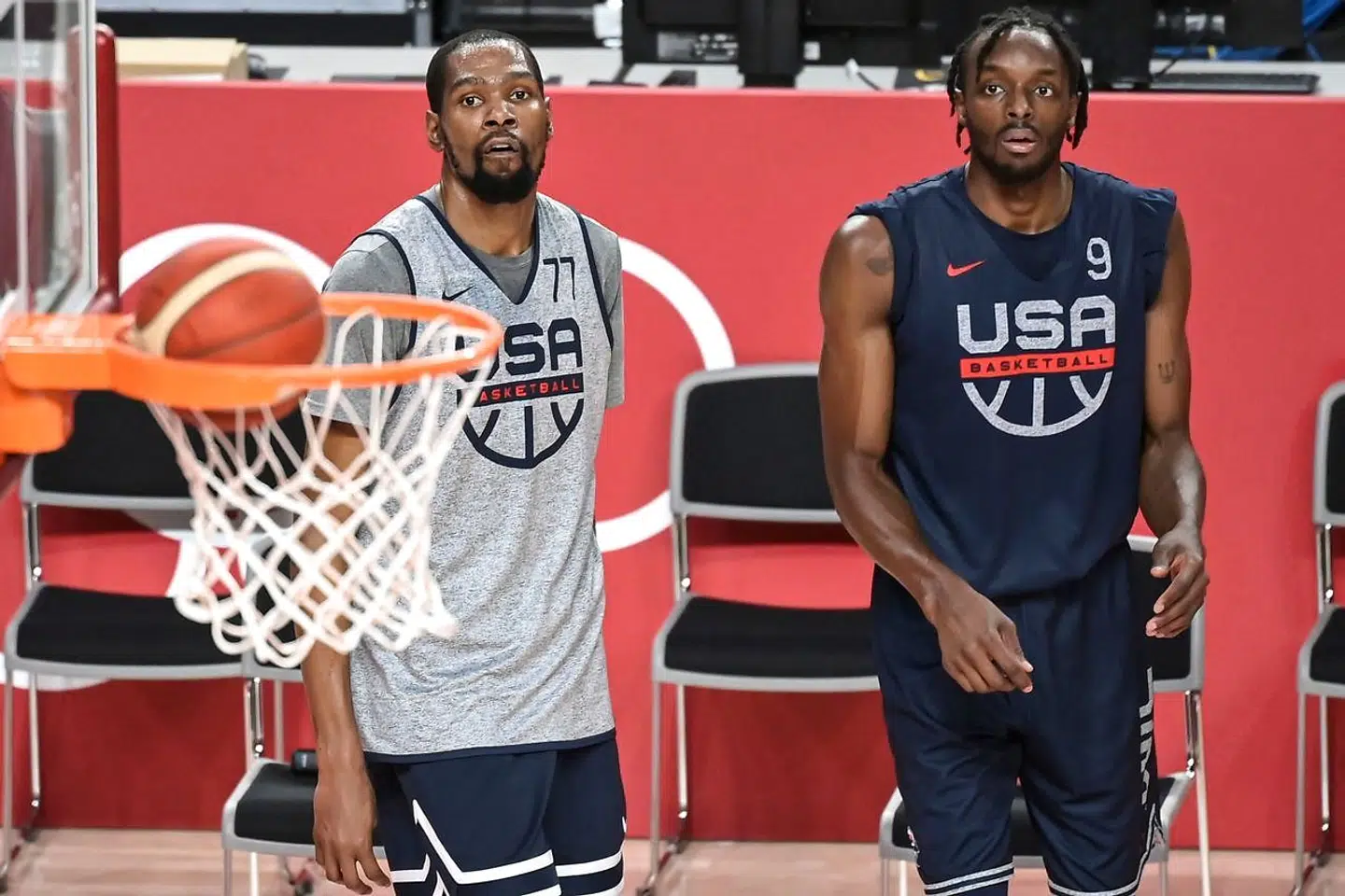 USA's Olympic basketball team player Kevin Durant (L) and Jerami Grant (R) attend a training session at the Saitama Super Arena in Saitama on July 22, 2021, ahead of the Tokyo 2020 Olympic Games. (Photo by ARIS MESSINIS / AFP)